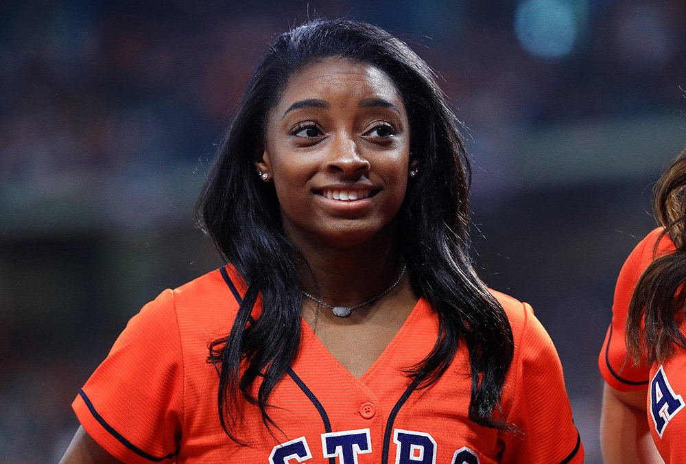 Gymnast Simone Biles looks on prior to Game Two of the 2019 World Series between the Houston Astros and the Washington Nationals at Minute Maid Park on October 23, 2019 in Houston, Texas. I Image: Getty Images.