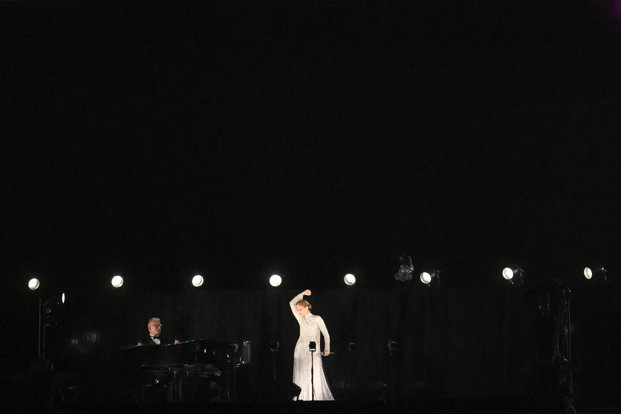 Celine Dion sings at the opening ceremony of the Summer Olympics, in Paris, France, on July 26, 2024. | Source: Getty Images