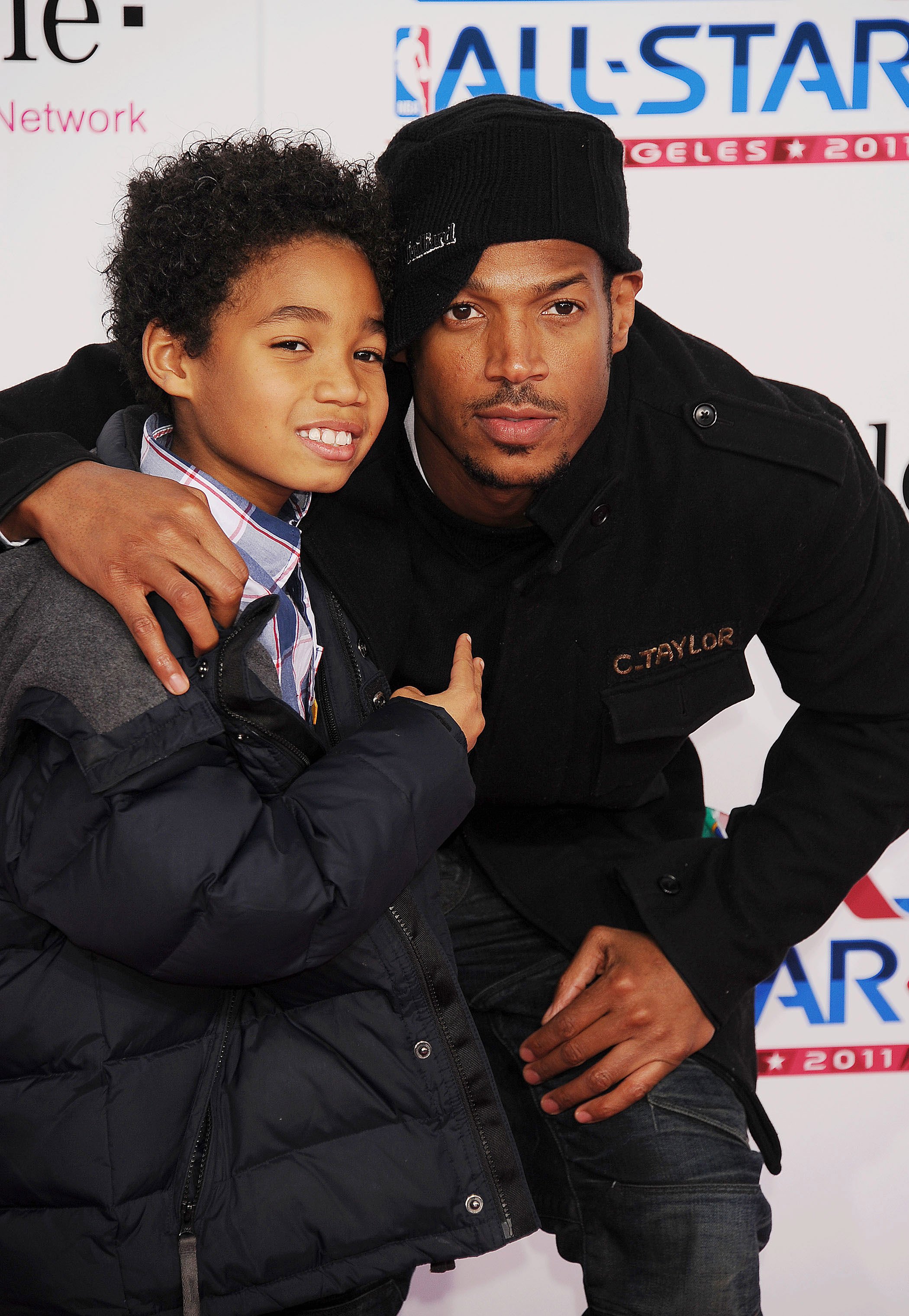 Marlon Wayans and Shawn Howell Wayans at the 2011 NBA All-Star Game in Los Angeles, California, on February 20, 2011 | Source: Getty Images 