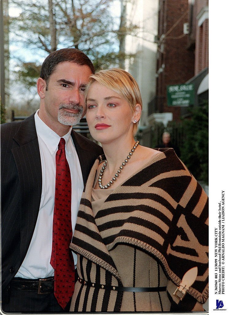 Sharon Stone and her husband Phil Bronstein stand outside their hotel | Getty Images