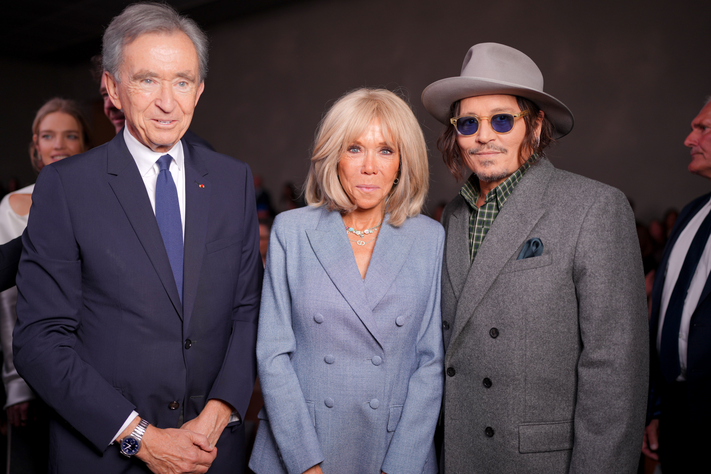 Bernard Arnault, Brigitte Macron, Johnny Depp at the Christian Dior fashion show as part of Spring/Summer 2026 Paris Fashion Week held at Les Tuileries on October 01, 2025 in Paris, France. | Source: Getty Images