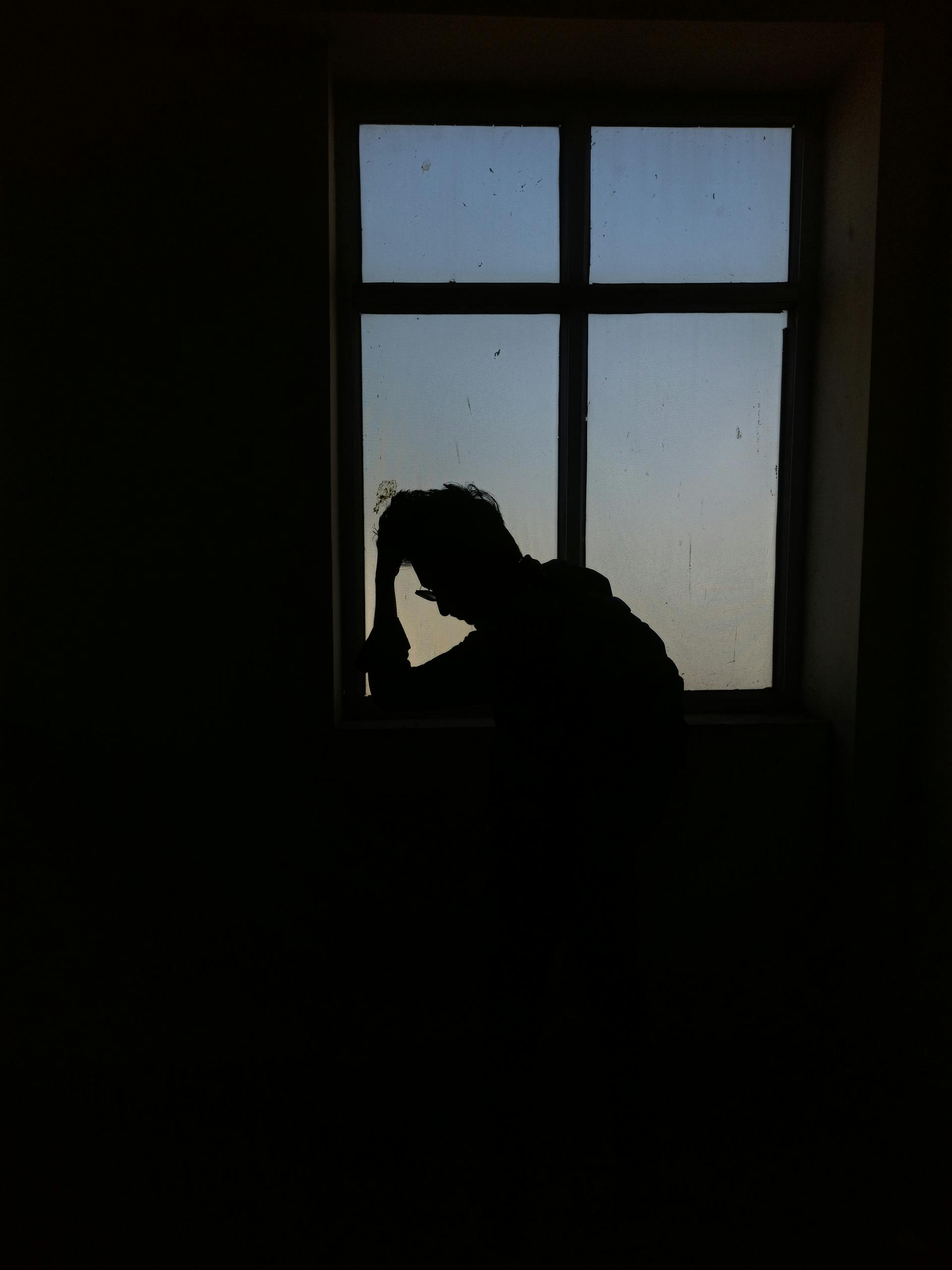 A man beside a window | Source: Pexels
