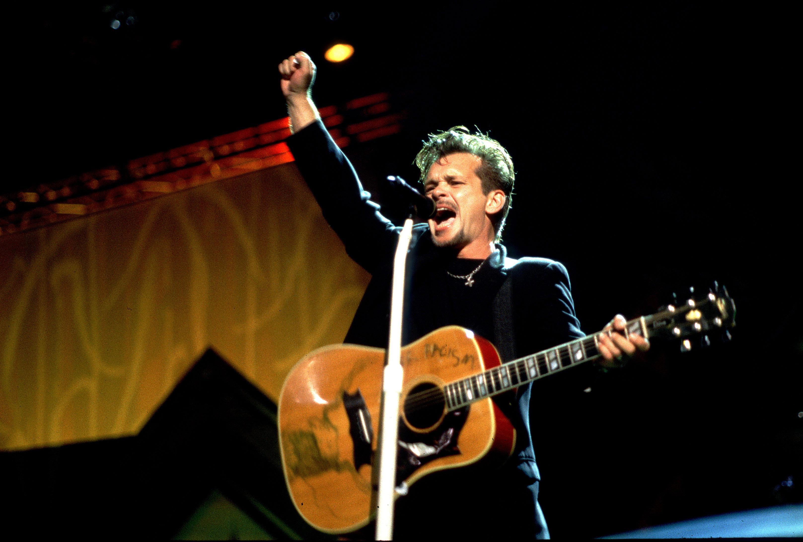 The singer performing on stage at Farm Aid in 1996 in Columbia, Sc | Source: Getty Images