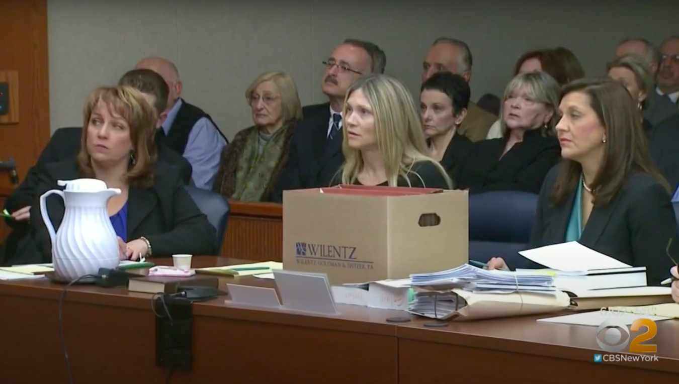 A screenshot of Amy Locane sitting in court with her legal team, posted on February 16, 2019 | Source: YouTube/CBS New York
