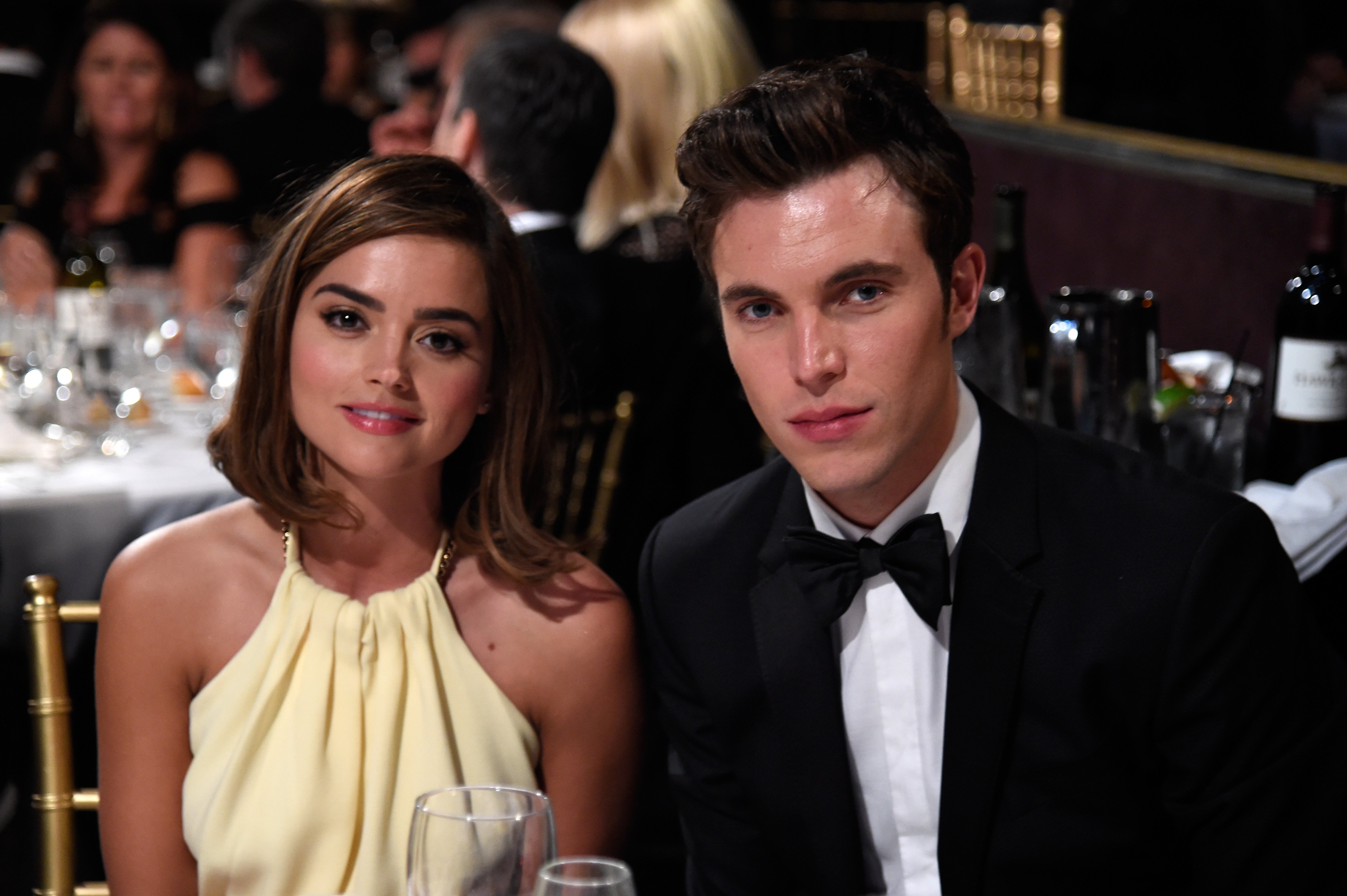 Jenna Coleman and actor Tom Hughes at The Beverly Hilton Hotel in Beverly Hills, California on October 30, 2014 | Source: Getty Images