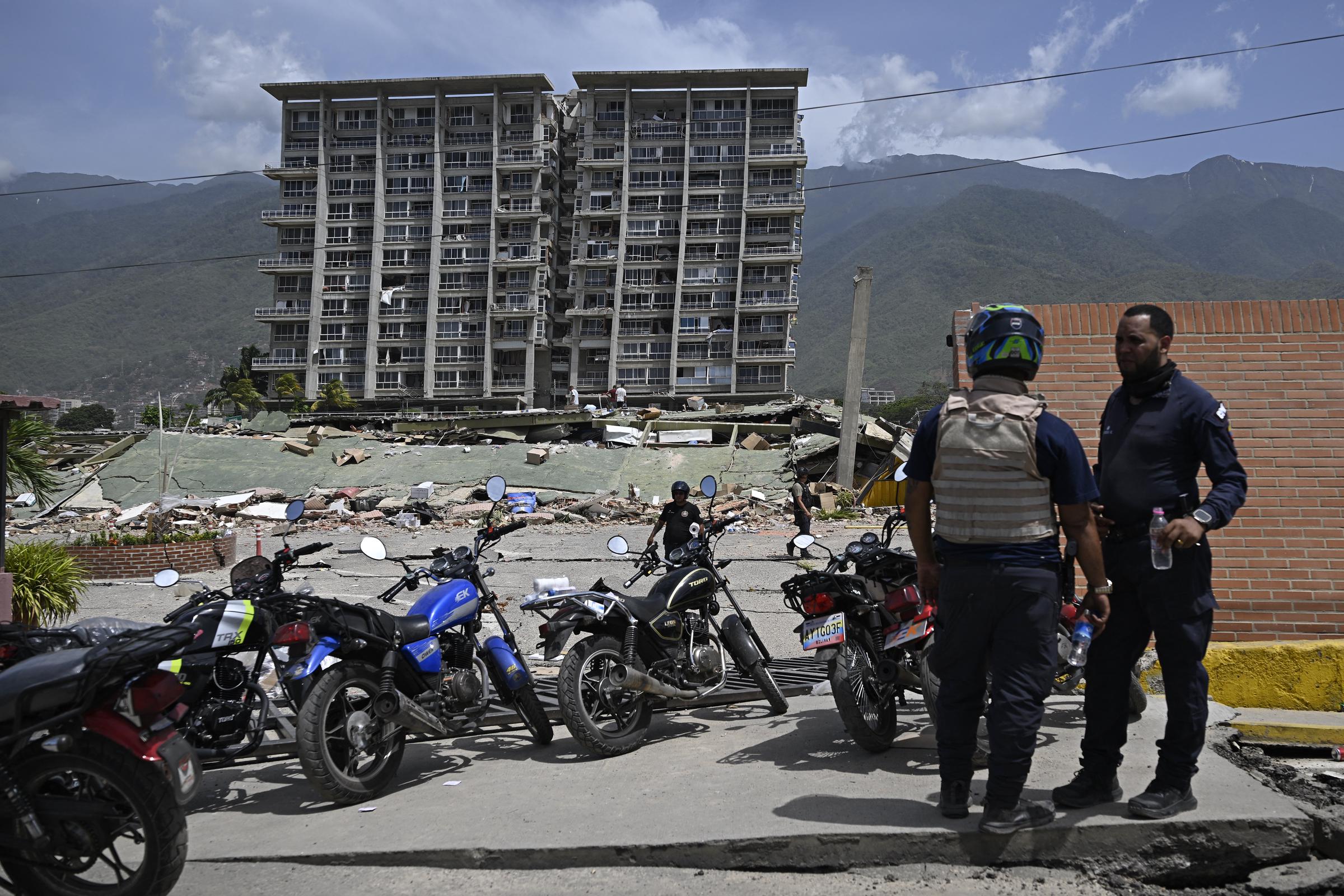Long before authorities confirmed who had survived, relatives climbed over piles of concrete searching for loved ones themselves. Lucas Trejo did the same after rushing home from Caracas, joining volunteers in the hope of finding his wife and two children alive. | Source: Getty Images