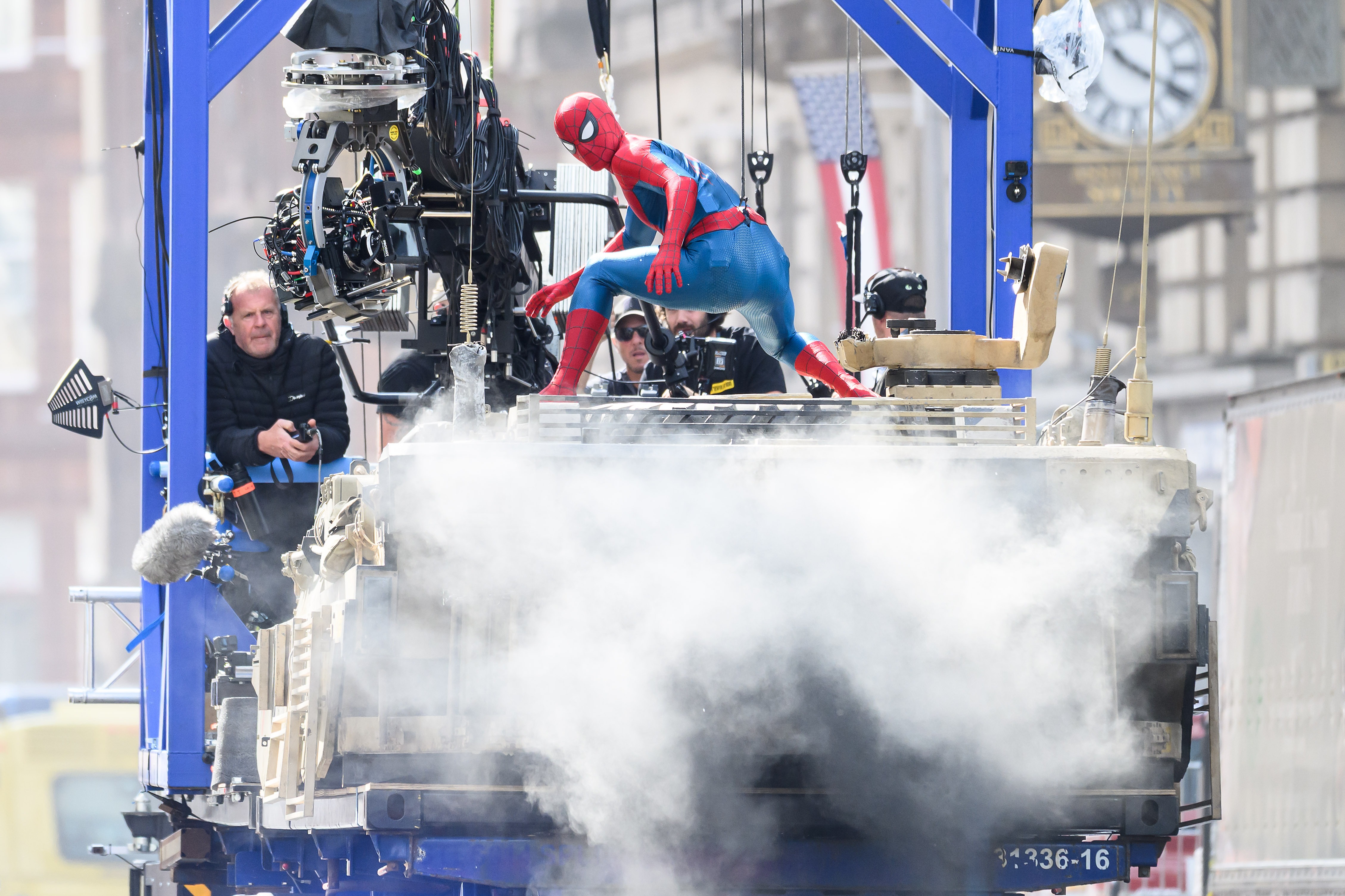Tom Holland is seen mid-stunt on the set of "Spider-Man: Brand New Day" in Glasgow, Scotland on August 3, 2025 | Source: Getty Images