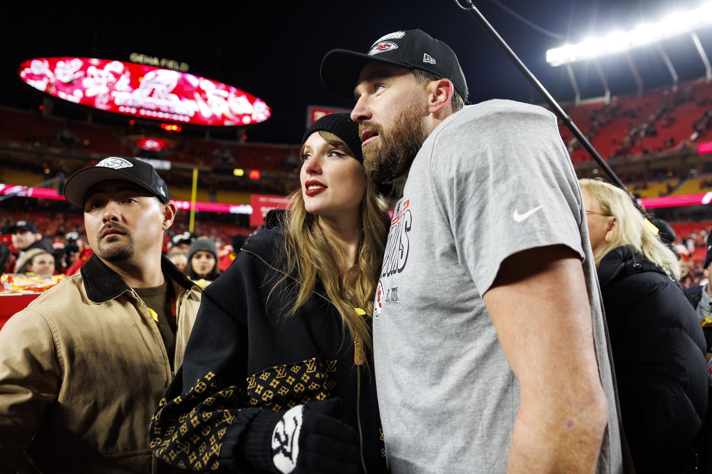 Tight end Travis Kelce #87 of the Kansas City Chiefs celebrates with Taylor Swift after the AFC Championship football game against the Buffalo Bills, at GEHA Field at Arrowhead Stadium on January 26, 2025, in Kansas City, Missouri | Source: Getty Images