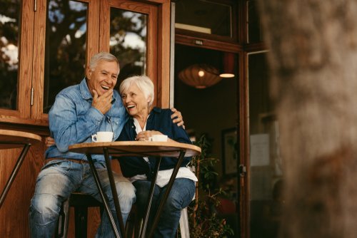 A couple enjoying themselves at a restaurant. | Source: Shutterstock. A couple enjoying themselves at a restaurant. | Source: Shutterstock.