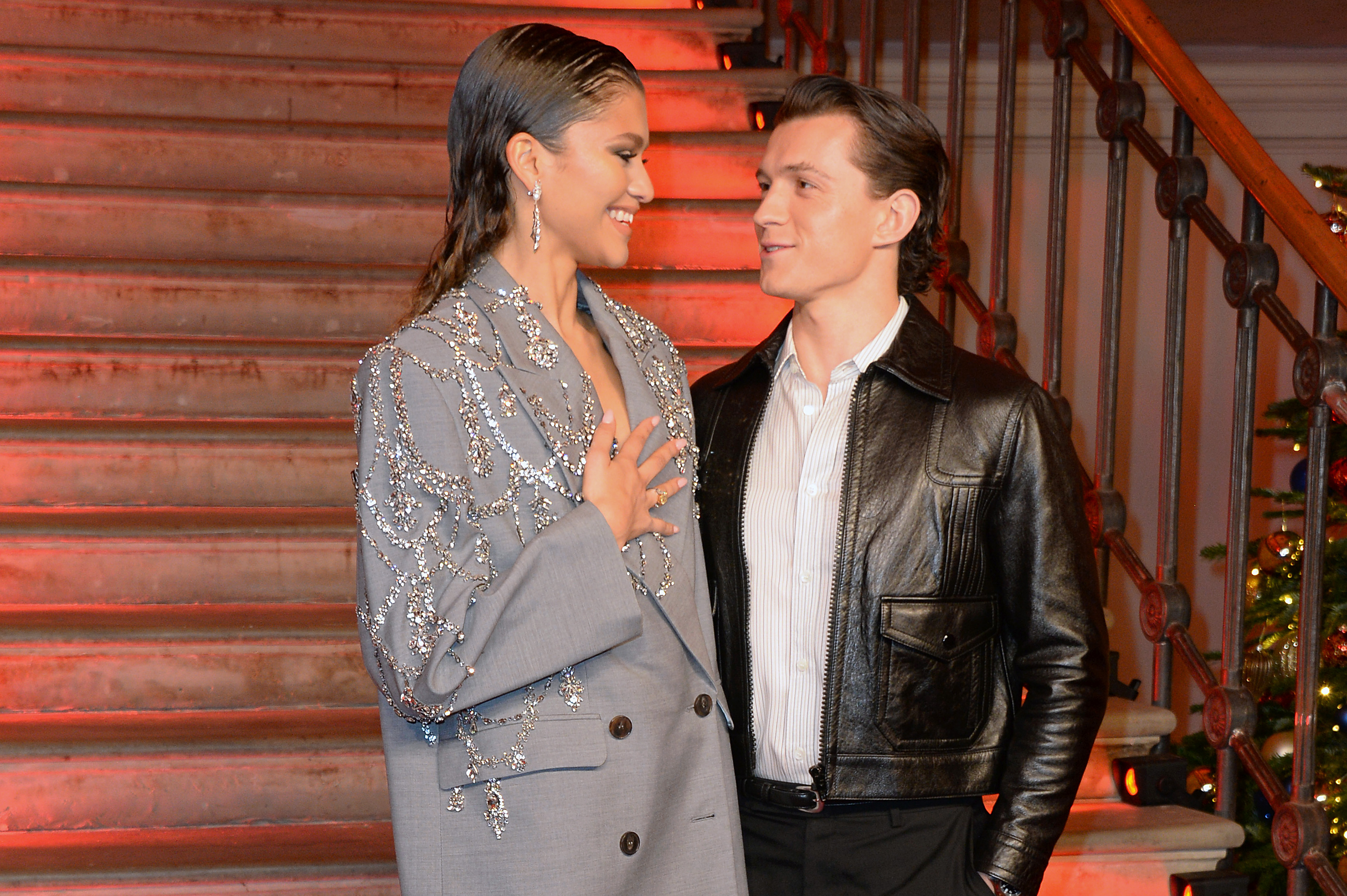 Zendaya and Tom Holland pose at a photocall for "Spider-Man: No Way Home" at The Old Sessions House in London, England, on December 5, 2021. | Source: Getty Images
