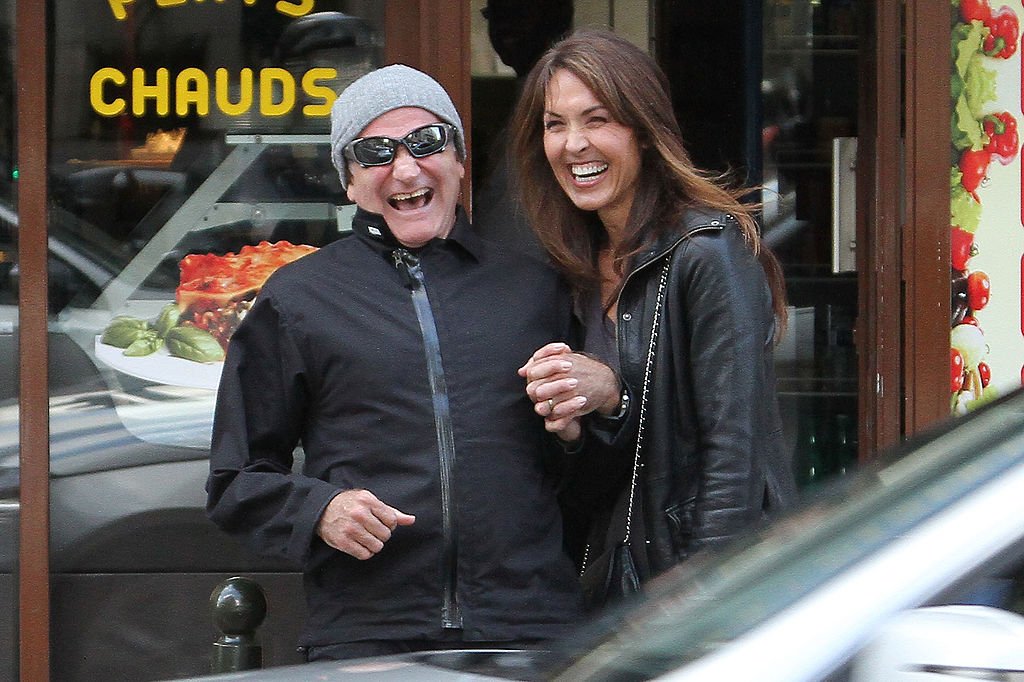 Robin Williams and Susan Schneider sighted leaving the 'Alex Singer' bike store on October 26, 2011, in Paris | Photo: Getty Images