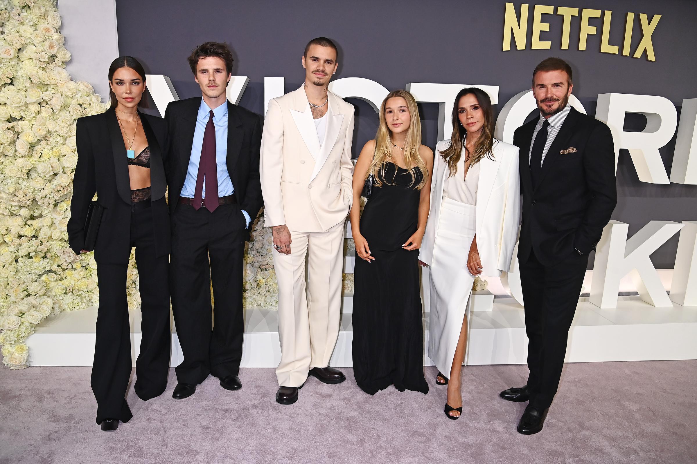 (L-R) Jackie Apostel, Cruz Beckham, Romeo Beckham, Harper Beckham, Victoria Beckham, and David Beckham attend the World Premiere of "Victoria Beckham" at The Curzon Mayfair on October 8, 2025, in London, England. | Source: Getty Images