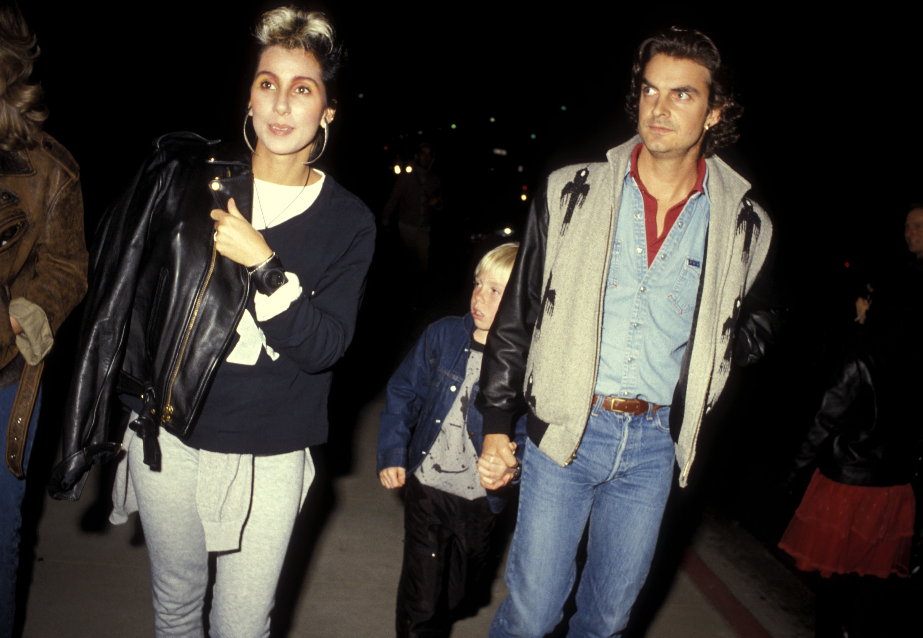 Cher, her boyfriend Josh Donen and her son Elijah Blue Allman attend "The Sure Thing" premiere on February 9, 1985 in Beverly Hills, California | Source: Getty Images
