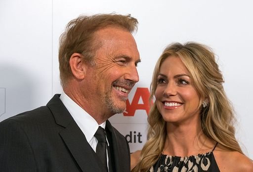Kevin Costner and his wife Christine Baumgartner pictured at the AARP The Magazine's 14th Annual Movies For Grownups Awards Gala, February 2015, California.