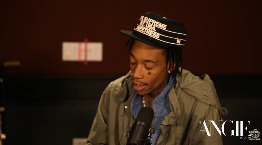 Wiz Khalifa speaks about his tattoos and personal style during an appearance on "The Angie Review." | Source: YouTube/Hot 97