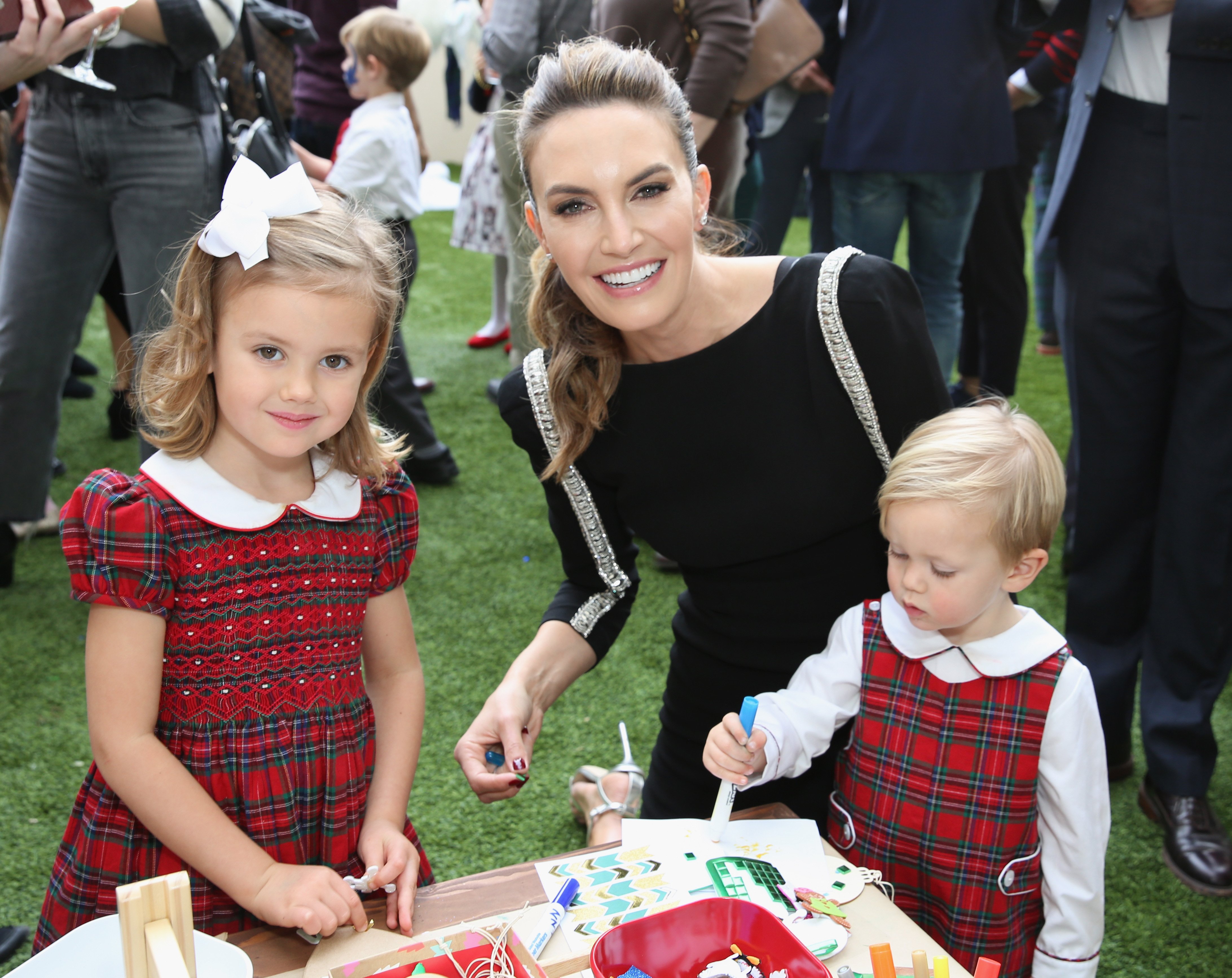 Harper Grace Hammer, Elizabeth Chambers, and Ford Armand Douglas Hammer at the Brooks Brothers and St Jude Children's Research Hospital Annual Holiday Celebration on December 9, 2018 | Source: Getty Images