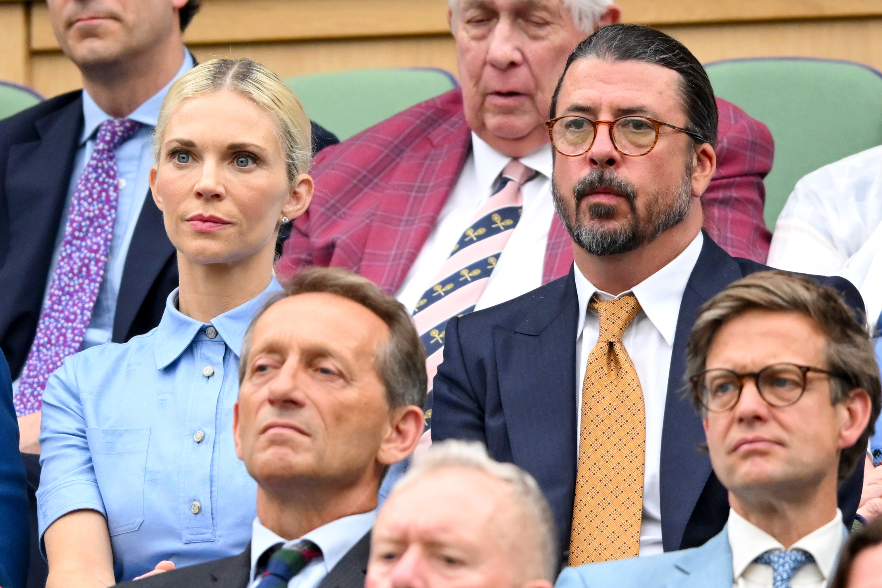 Dave Grohl, and his wife Jordyn Grohl are seen in the Royal Box at during day two of The Championships Wimbledon 2024 All England Lawn Tennis and Croquet Club on July 02, 2024, in London, England. | Source: Getty Images