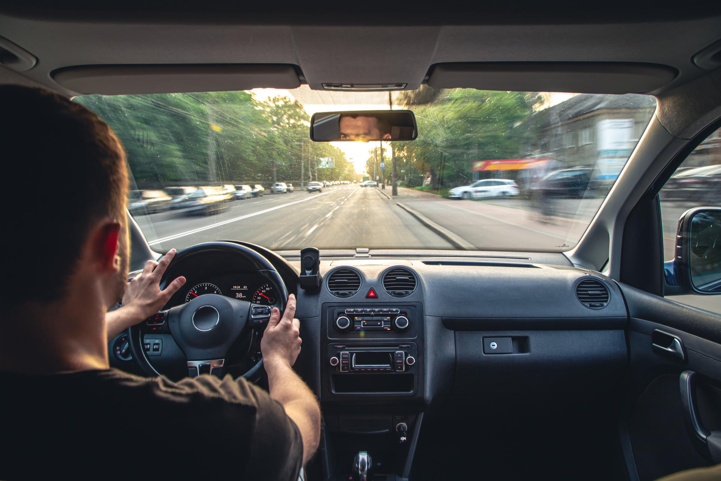 A man driving | Source: Freepik