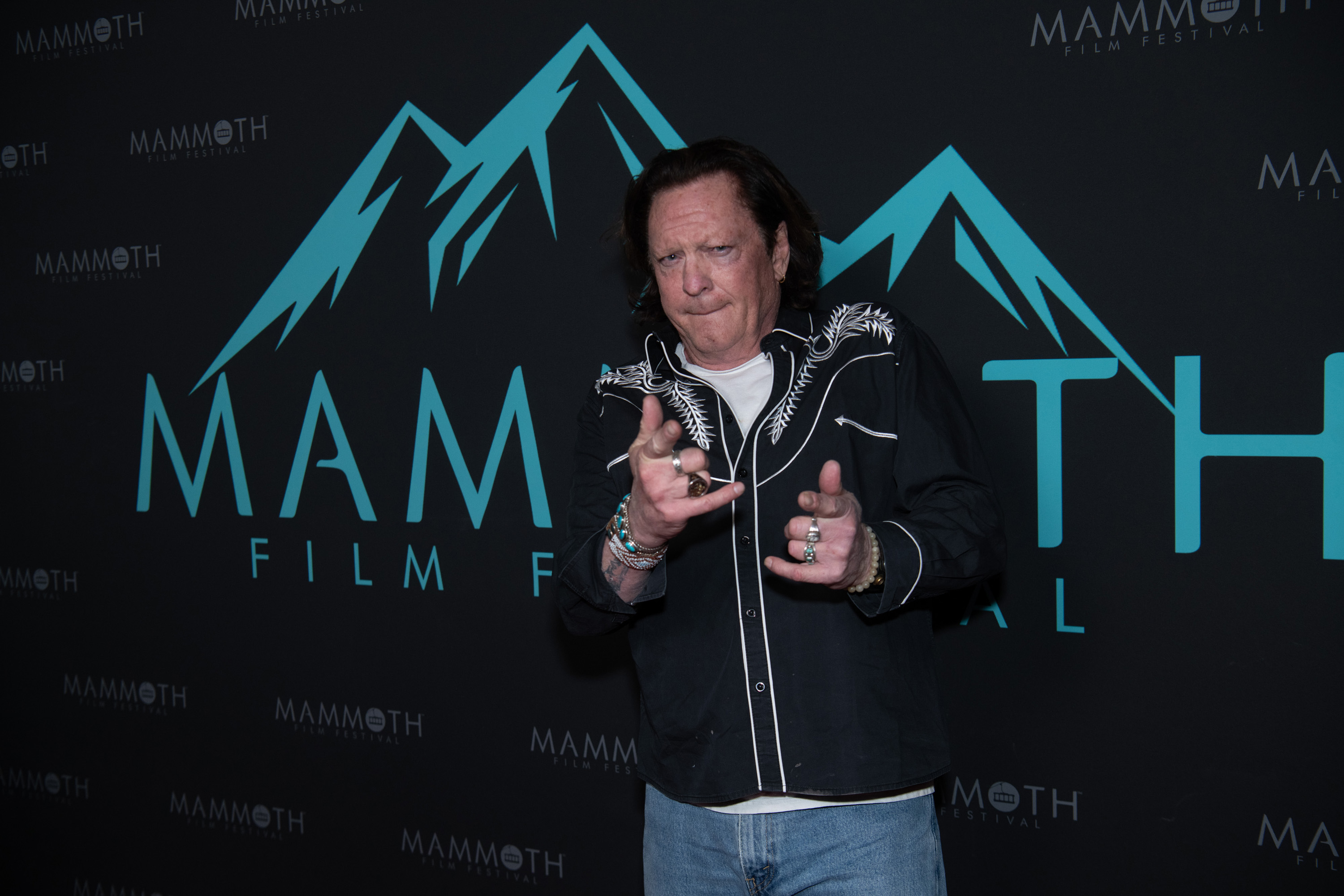 Michael Madsen poses for photos on March 2, 2024, during Day Three of the Mammoth Film Festival in Mammoth, California | Source: Getty Images