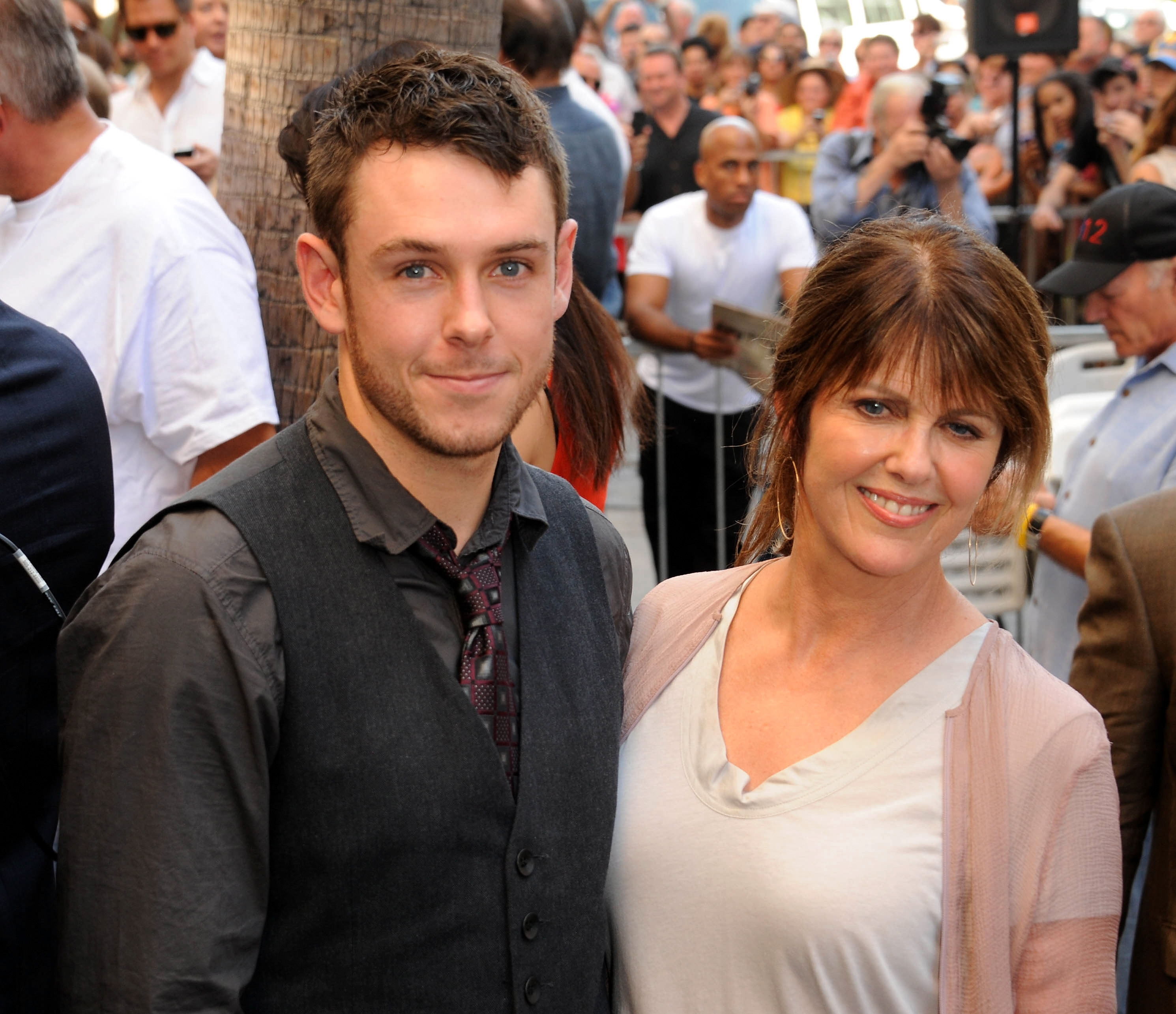 Pam Dawber and her son participate in the Mark Harmon star ceremony on the Hollywood Walk of Fame on October 1, 2012, in Hollywood, California | Source: Getty Images