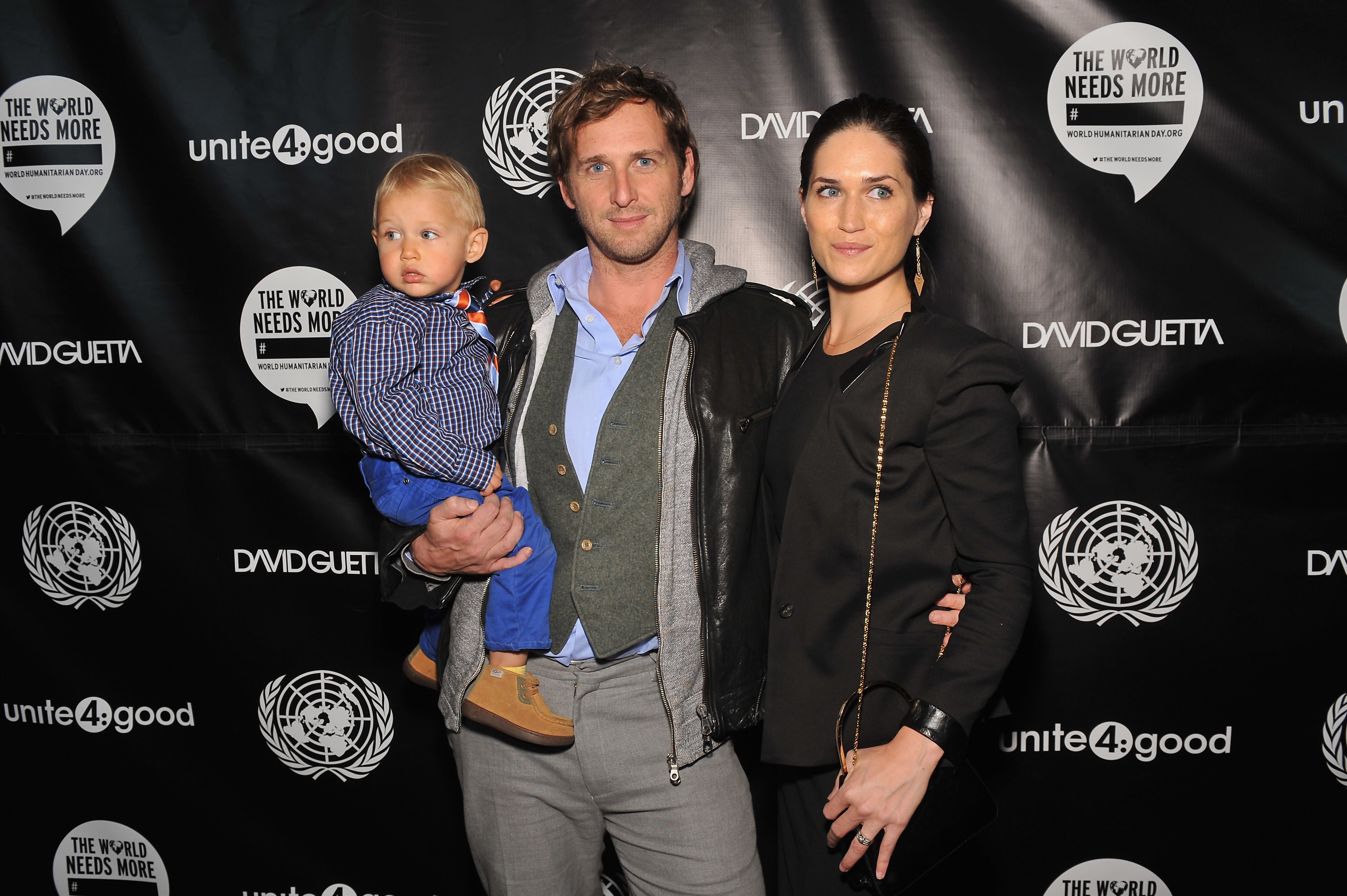Josh Lucas, Jessica Henriquez, and their son Noah Rev Lucas, attend David Guetta's new music video premiere "One Voice" at the United Nations headquarters on November 22, 2013, in New York City. | Source: Getty Images