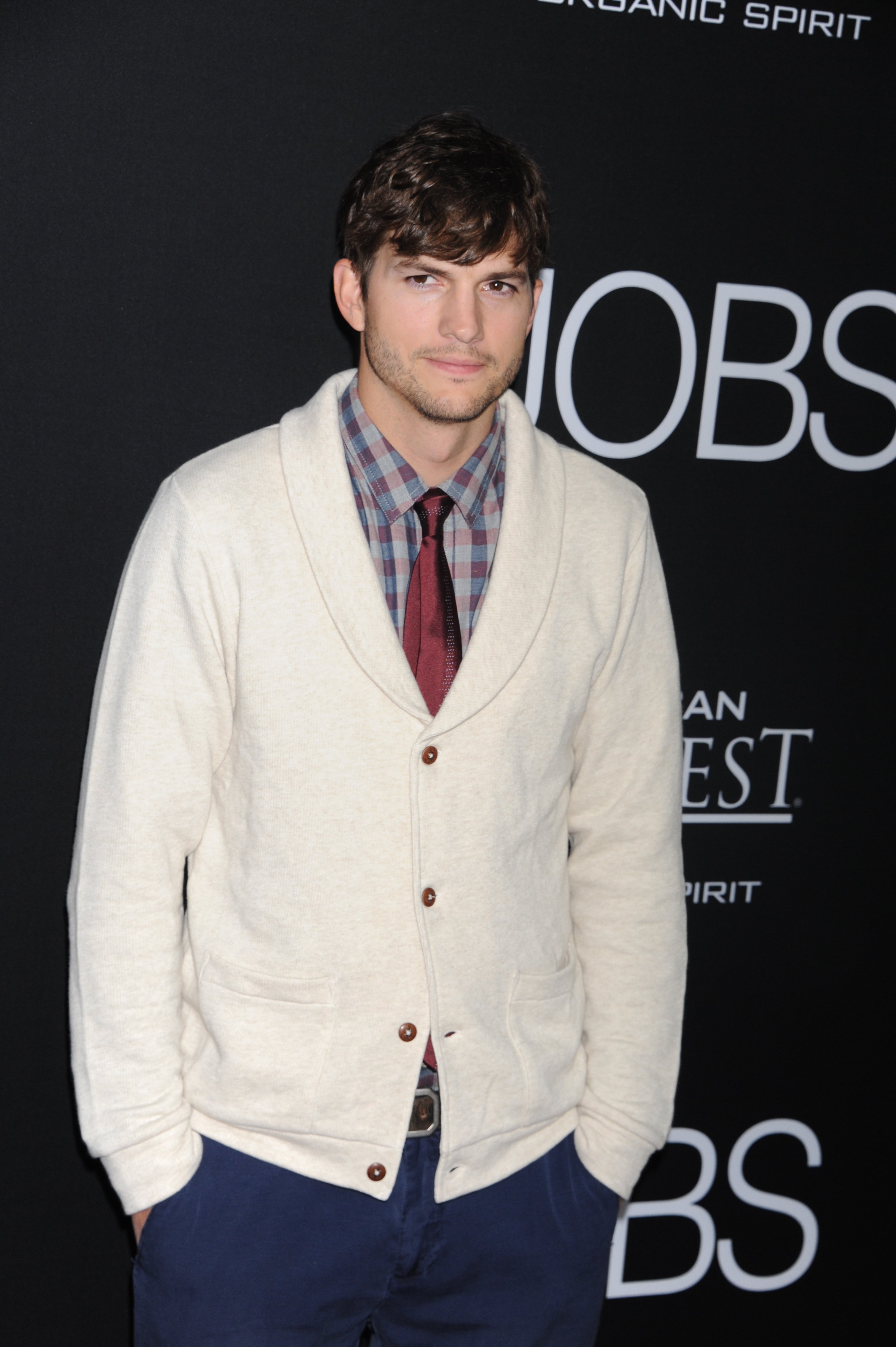 Actor Ashton Kutcher arrives at the Jobs premiere at Regal Cinemas L.A. Live. | Source: Getty Images