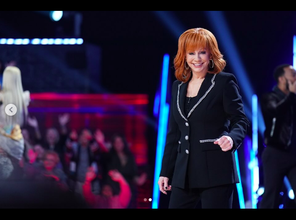Reba McEntire posing for a picture during "The Voice" posted on November 22, 2023 | Source: Instagram/reba