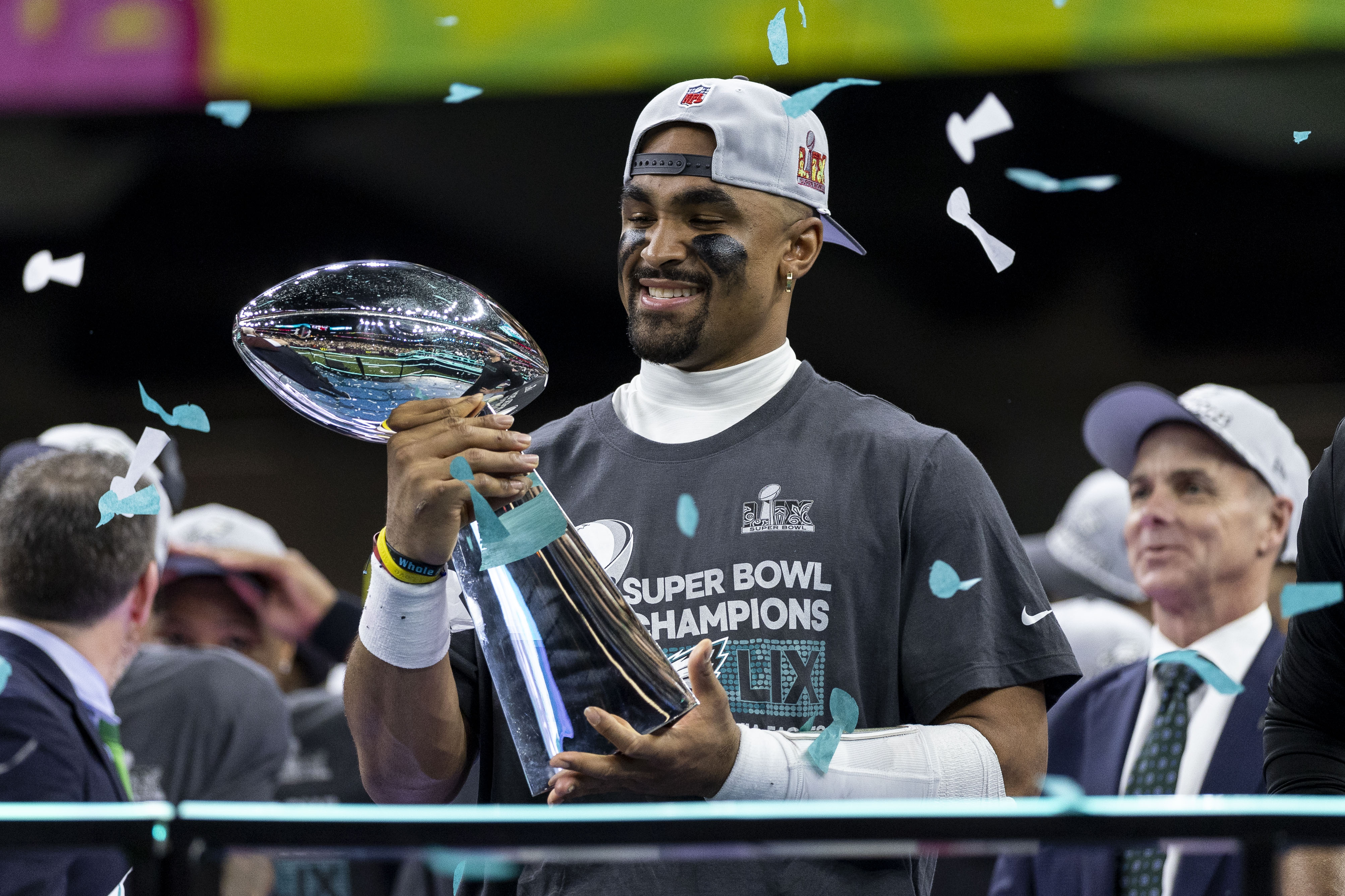 Jalen Hurts of the Philadelphia Eagles holding the Vince Lombardi Trophy following his Super Bowl LIX victory over the Kansas City Chiefs at Caesars Superdome on February 9, 2025, in New Orleans, Louisiana. | Source: Getty Images