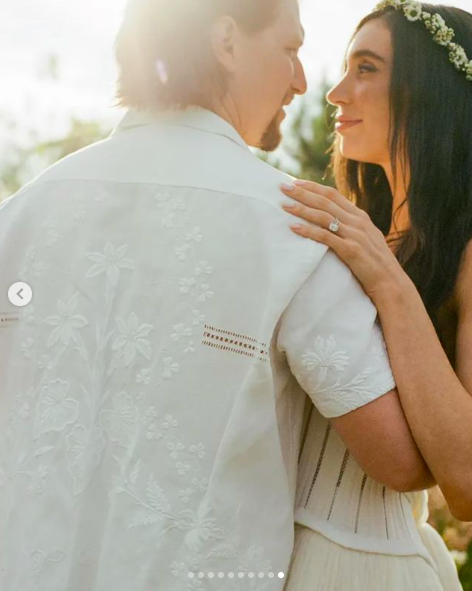 Jesse Bongiovi and Jesse Light sharing a tender moment during their five-day wedding celebration, posted on July 13, 2024 | Source: Instagram/alison_events