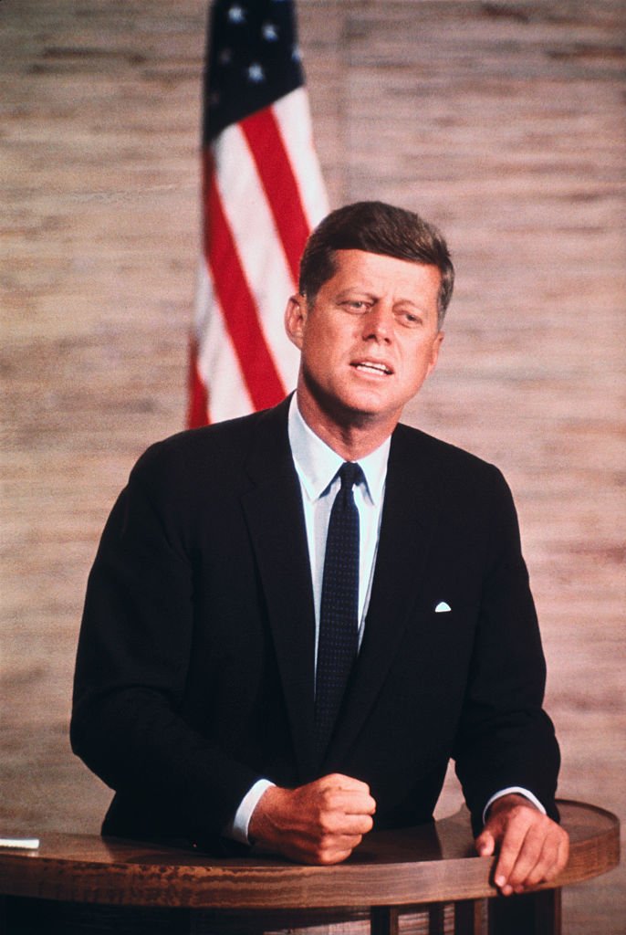 A portrait of Late John F. Kennedy Speaking on a Podium on October 01, 1960 | Photo: Getty Images