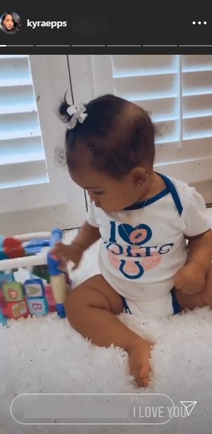 A picture of Kyra Epps' daughter, Indiana playing with a toy. | Photo: Instagram/Kyraepps