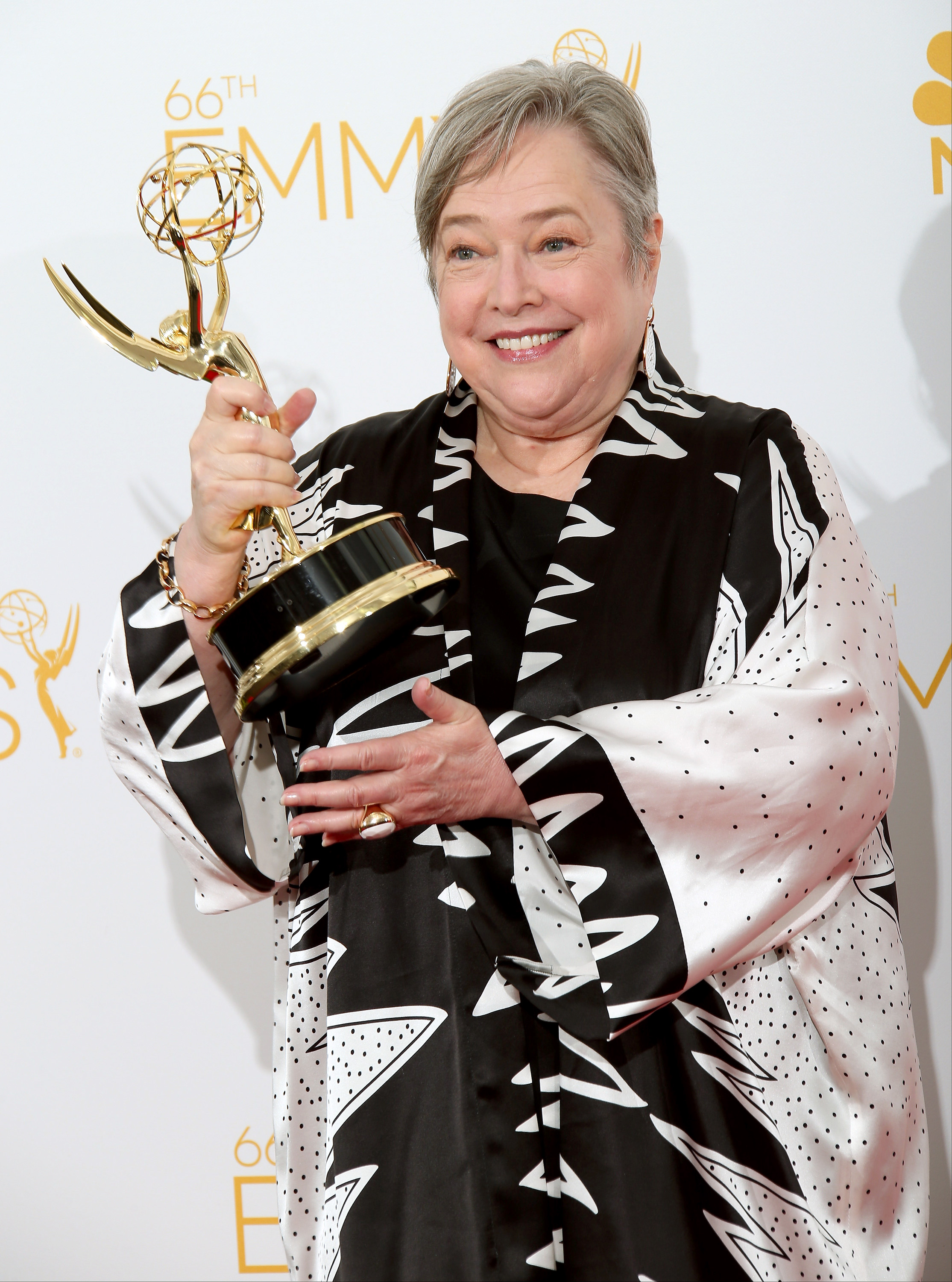 Kathy Bates poses in the photo room with her award for Outstanding Supporting Actress in a Miniseries or Movie for "American Horror Story" at Nokia Theatre in Los Angeles, California, on August 25, 2014 | Source: Getty Images