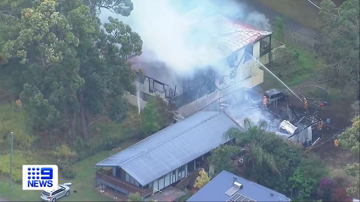 An aerial view of emergency crews putting out the fire at Wayne Godinet and Samantha Stephenson's home on August 6, 2023 in Queensland, Australia | Source: Facebook/9News
