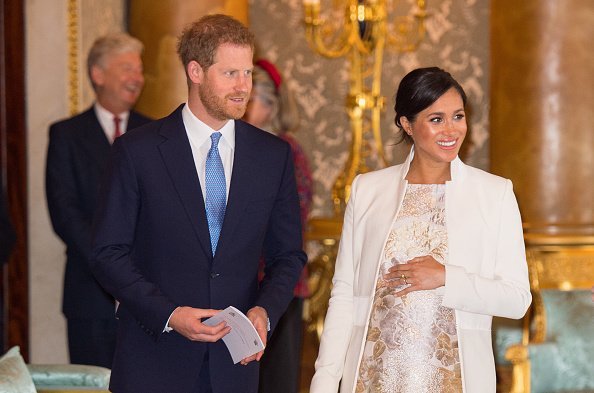 Meghan Markle and Prince Harry, Duke of Sussex attend the fiftieth anniversary of the investiture of the Prince of Wales at Buckingham Palace on March 5, 2019, in London, England.| Source: Getty Images.