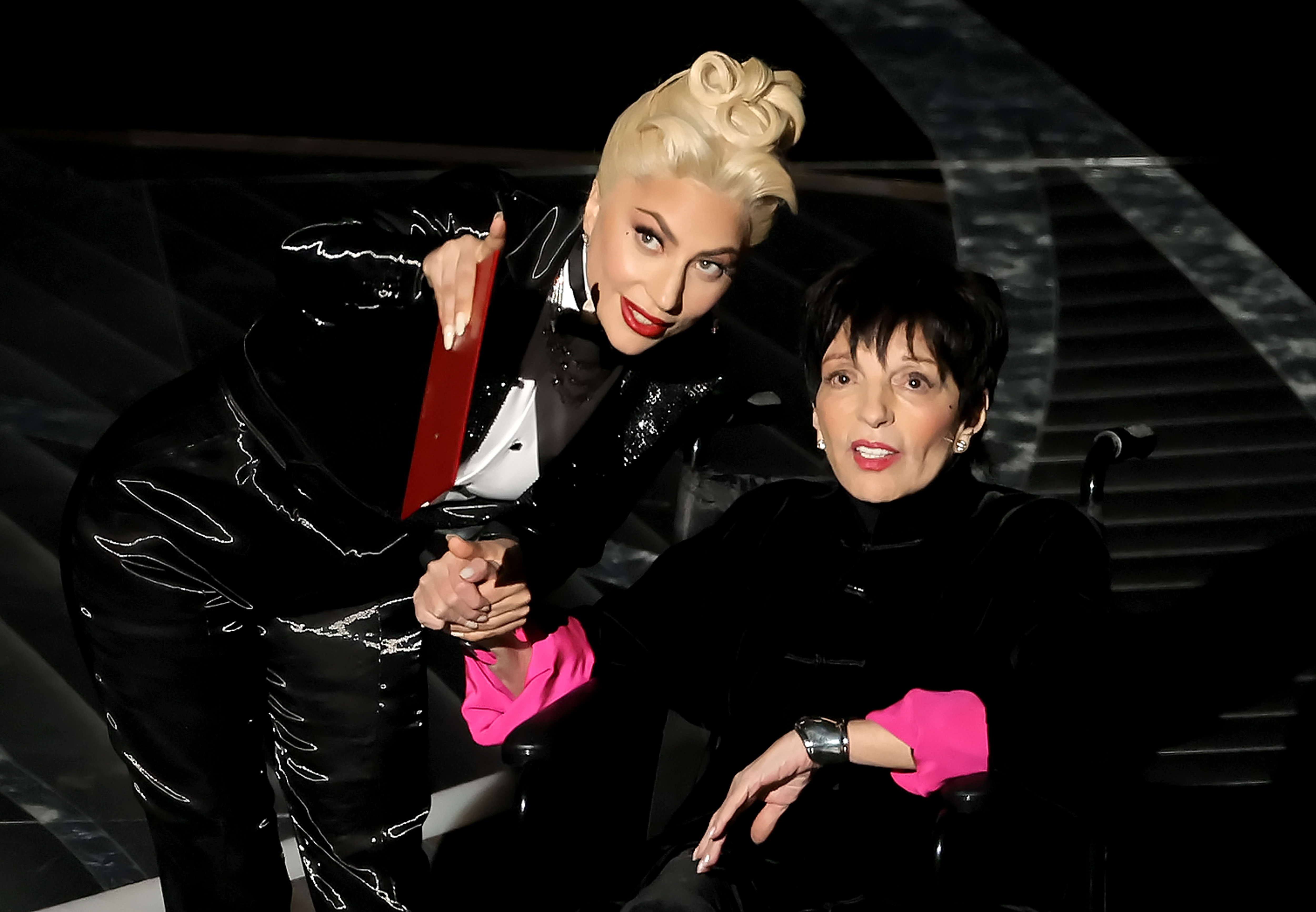 Lady Gaga and Liza Minnelli speak on stage during the 94th Annual Academy Awards at the Dolby Theatre on March 27, 2022, in Hollywood, California. | Source: Getty Images