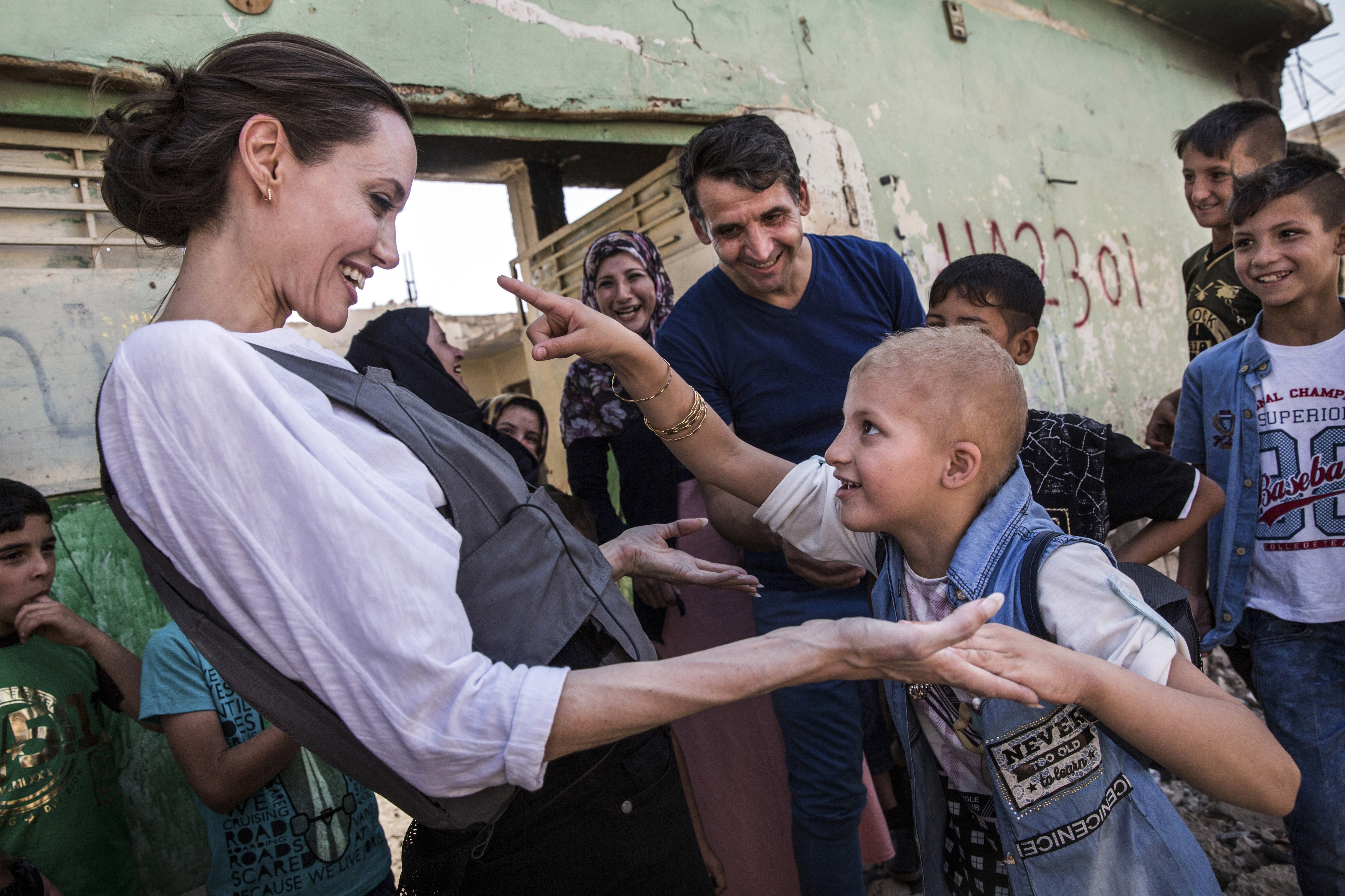 Angelina Jolie meets Falak, 8, during a visit to West Mosul during a visit to Iraq, on June 16, 2018. | Source: Getty Images