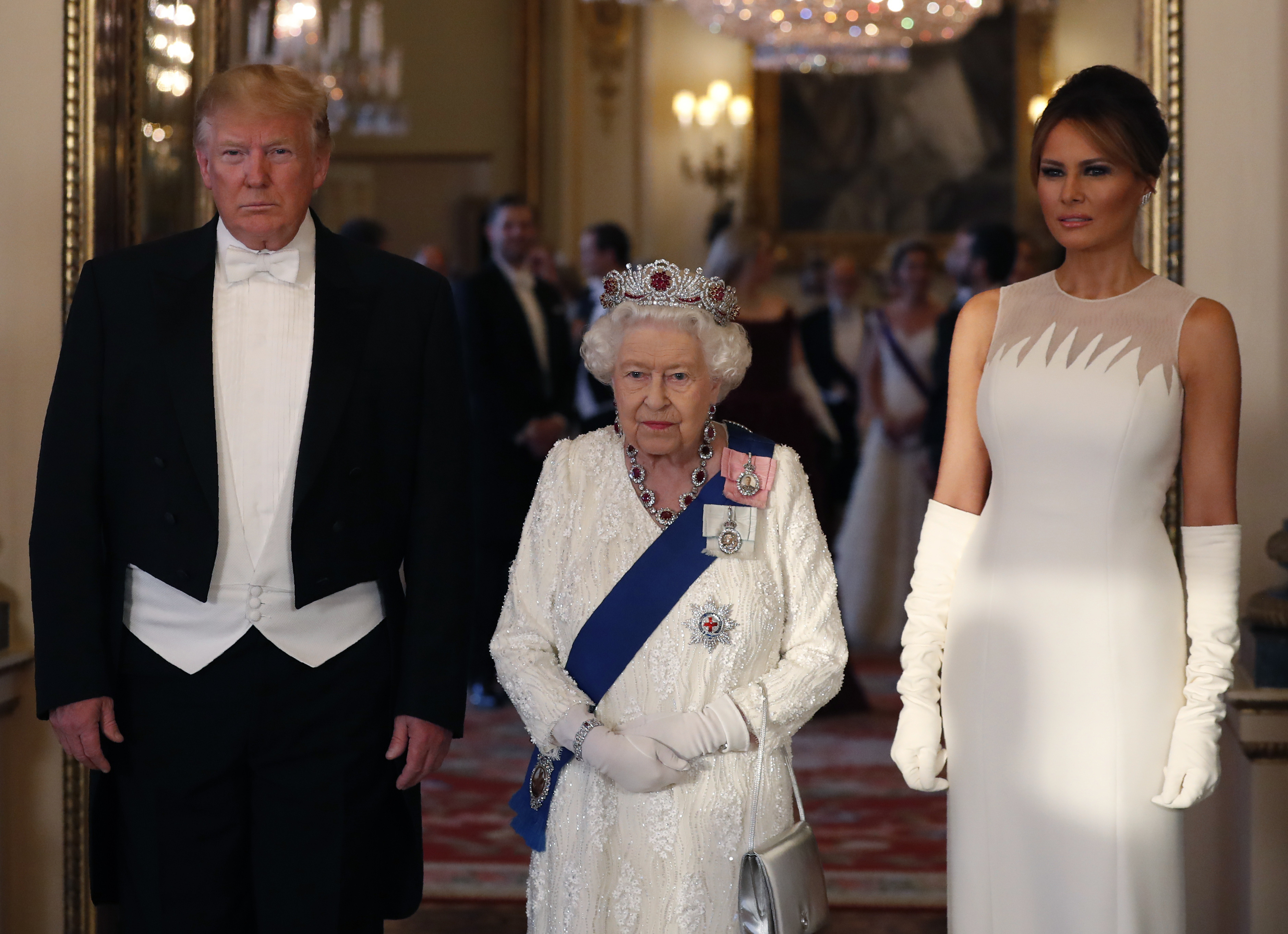 Queen Elizabeth II (C), poses for a photo with U.S. President Donald Trump (L) and First Lady Melania Trump (R) ahead of a State Banquet at Buckingham Palace on June 3, 2019, in London, England. | Source: Getty Images