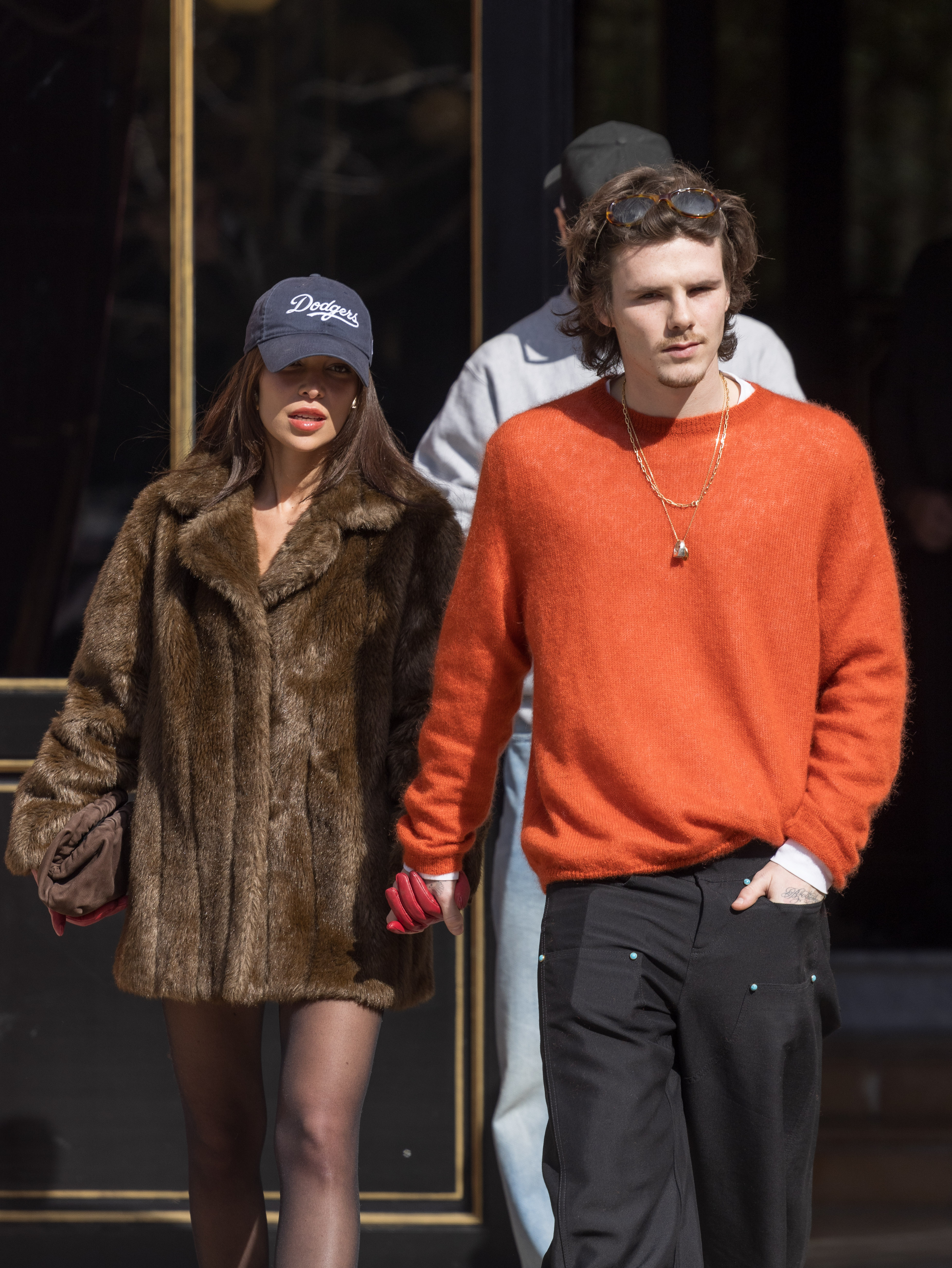 Hand in hand and coordinated in style, Beckham and Apostel turn the streets of Paris into a runway on 7 March 2025, during Womenswear Fall/Winter 2025/2026.