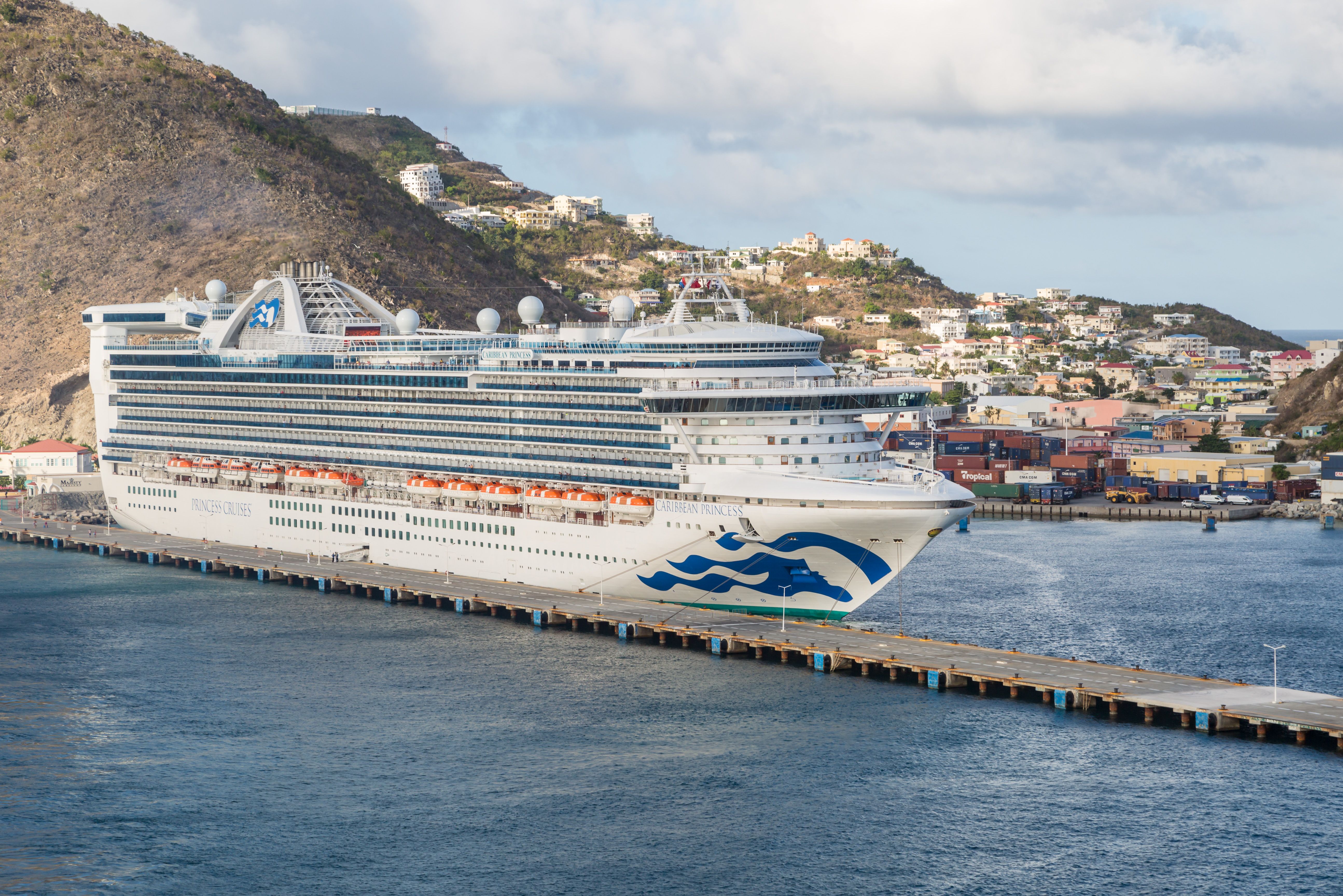 Princess Cruises' Caribbean Princess cruise ship is pictured at a port in Phillipsburg on the island of Sint Maarten in the Caribbean Sea on May 30, 2018. | Source: Getty Images