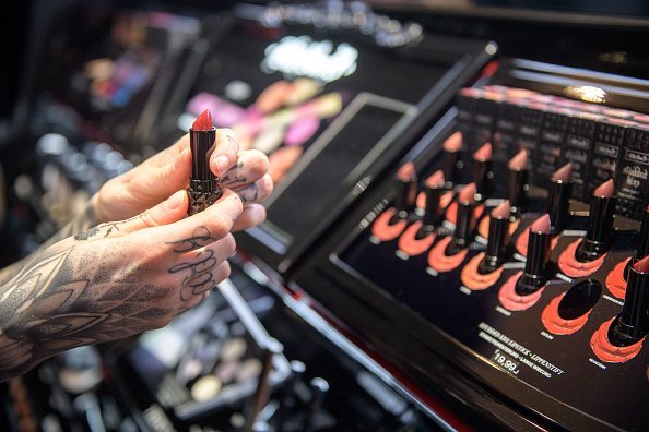 A collection of various types of colors of lipsticks at a make-up and cosmetic products shop | Photo: Getty Images