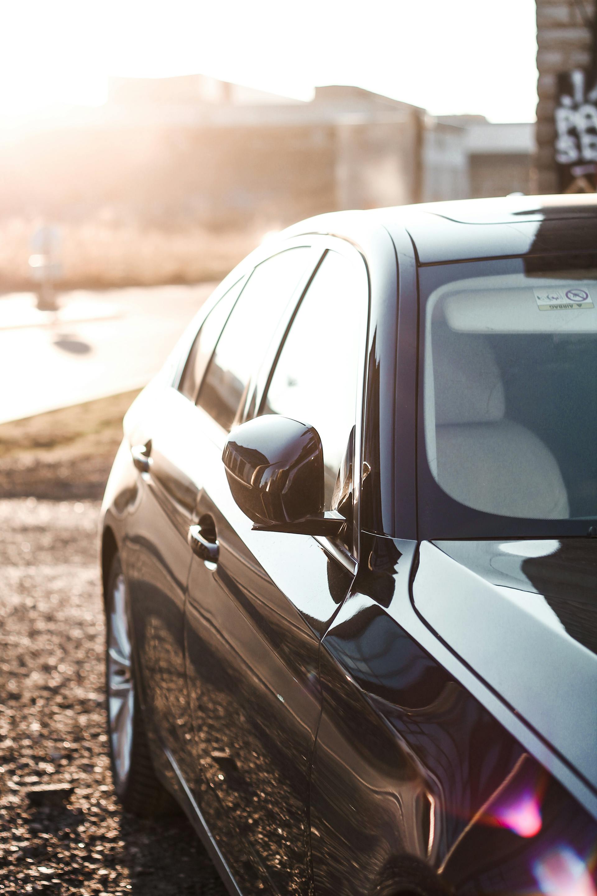 A closeup shot of a black car parked on a street | Source: Pexels