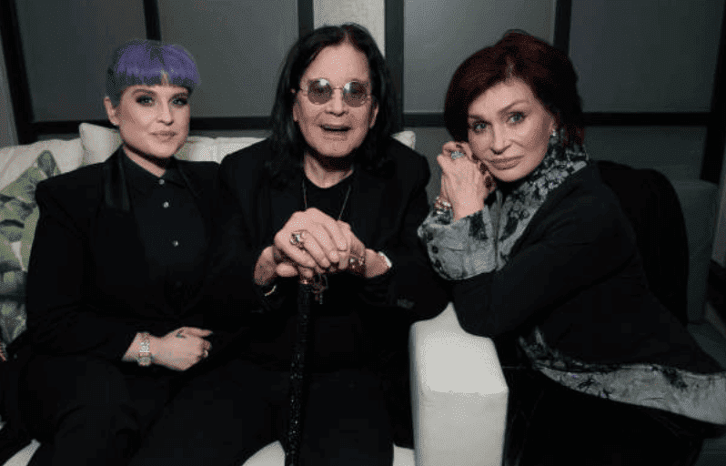 Kelly Osbourne, Ozzy Osbourne and Sharon Osbourne sit an couch while making an appearance at the after party for “A Million Little Pieces” on December 04, 2019, in West Hollywood, California | Source: Emma McIntyre/Getty Images
