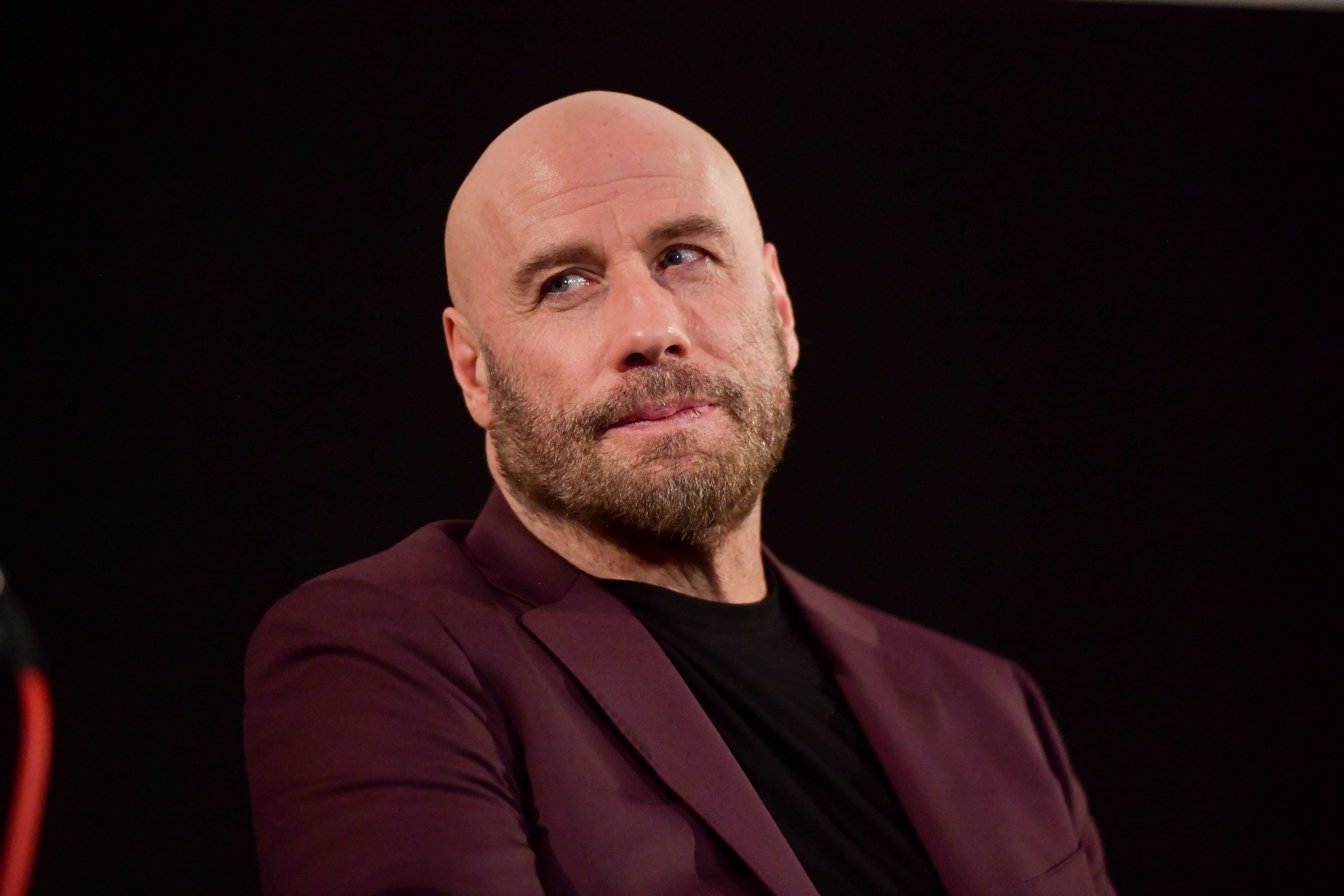 John Travolta onstage at the premiere of Quiver Distribution's "The Fanatic" on August 22, 2019 | Photo: Getty Images