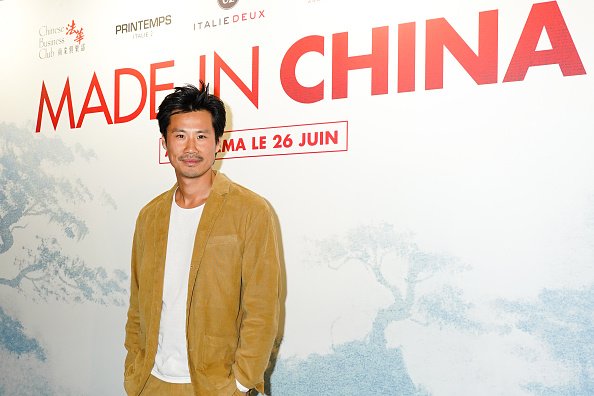 Frédéric Chau assiste au photocall "Made In China" Paris Premiere au 13eme Art cinema, dans le 13ème quartier de Paris, le 17 juin 2019 à Paris, France. | Photo : Getty Images