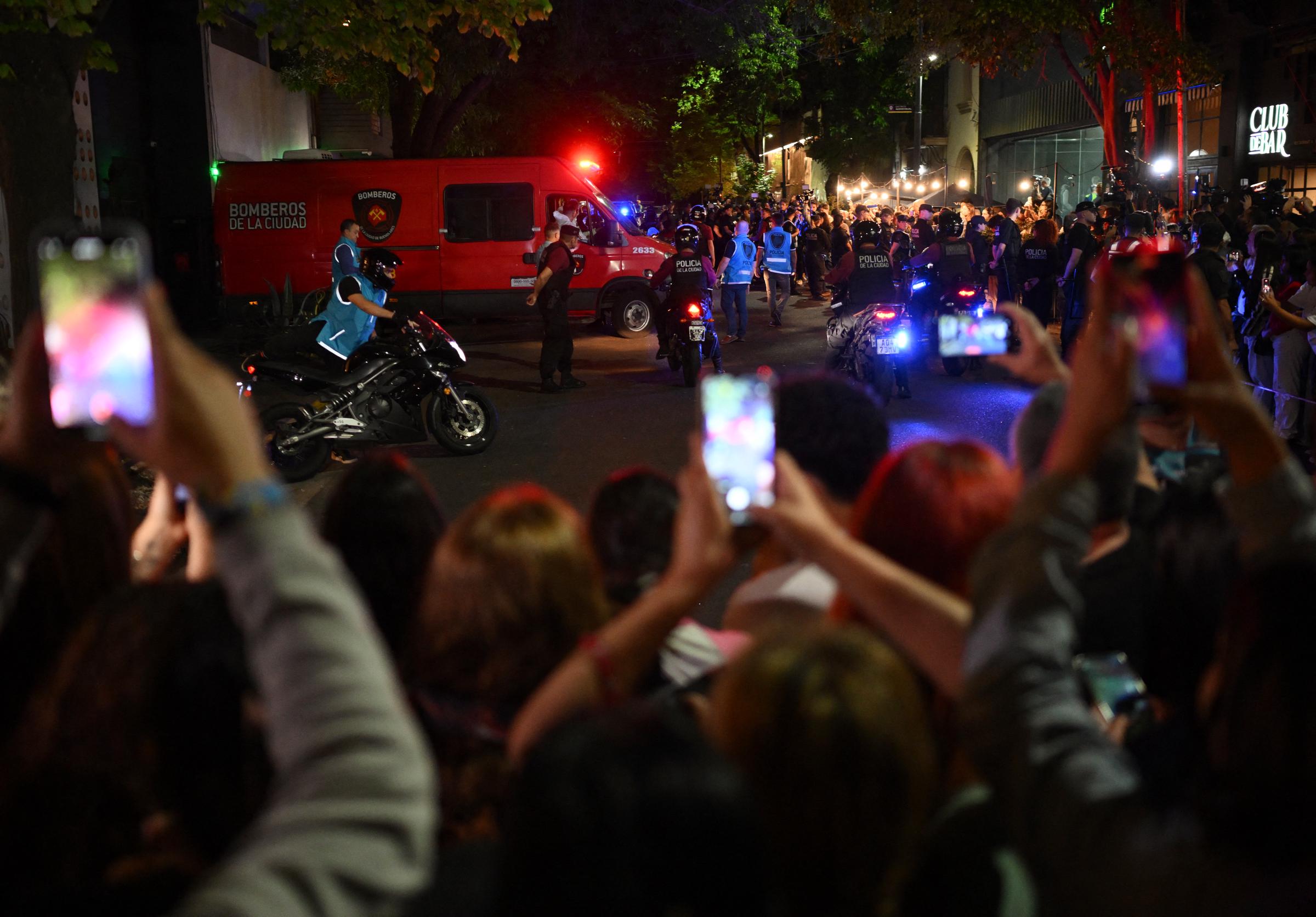 Forensic workers leaving the hotel where Liam Payne died in Buenos Aires, Argentina, on October 16, 2024. | Source: Getty Images