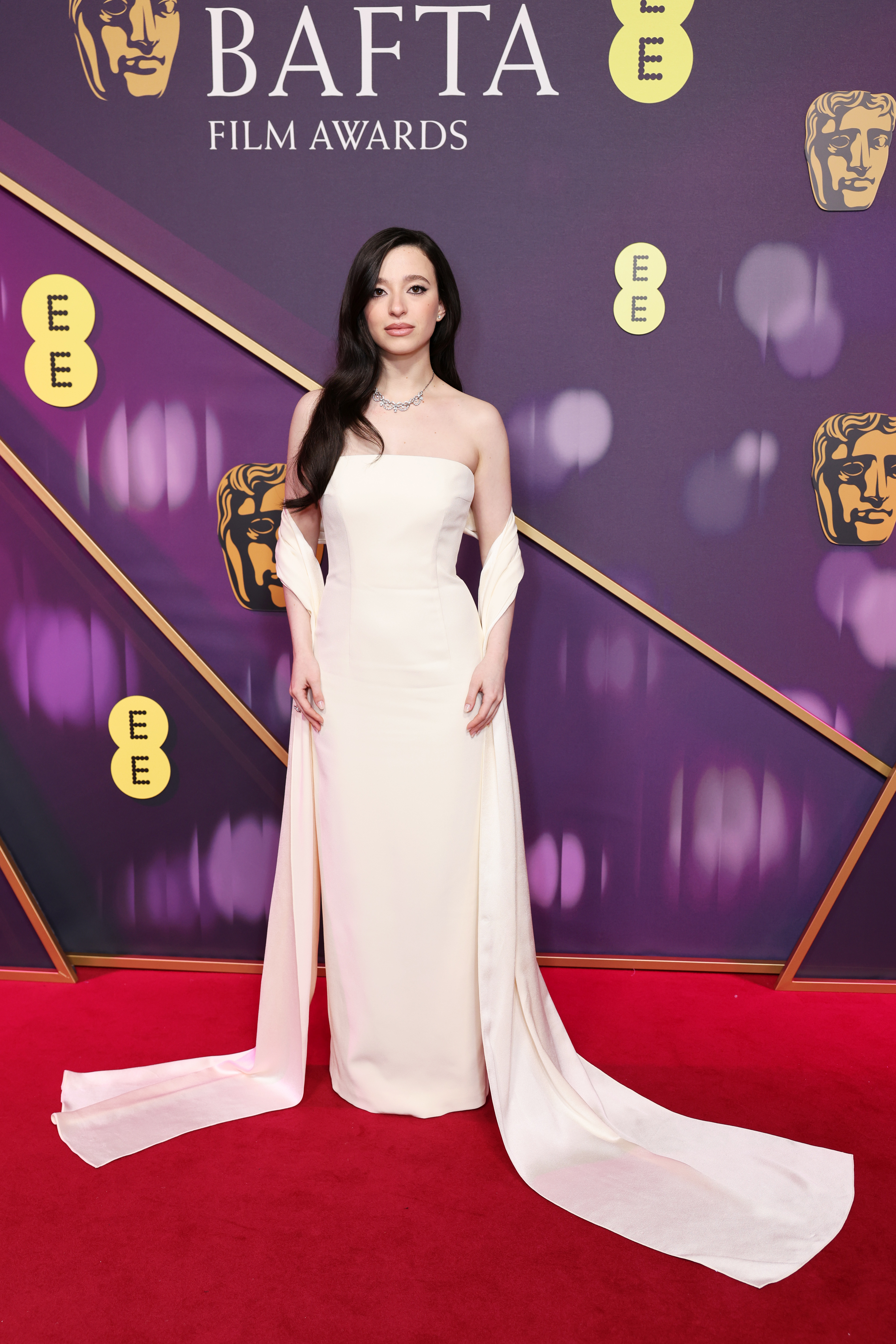 Mikey Madison poses on the red carpet at the EE BAFTA Film Awards on February 16, 2025, in London, England. | Source: Getty Images