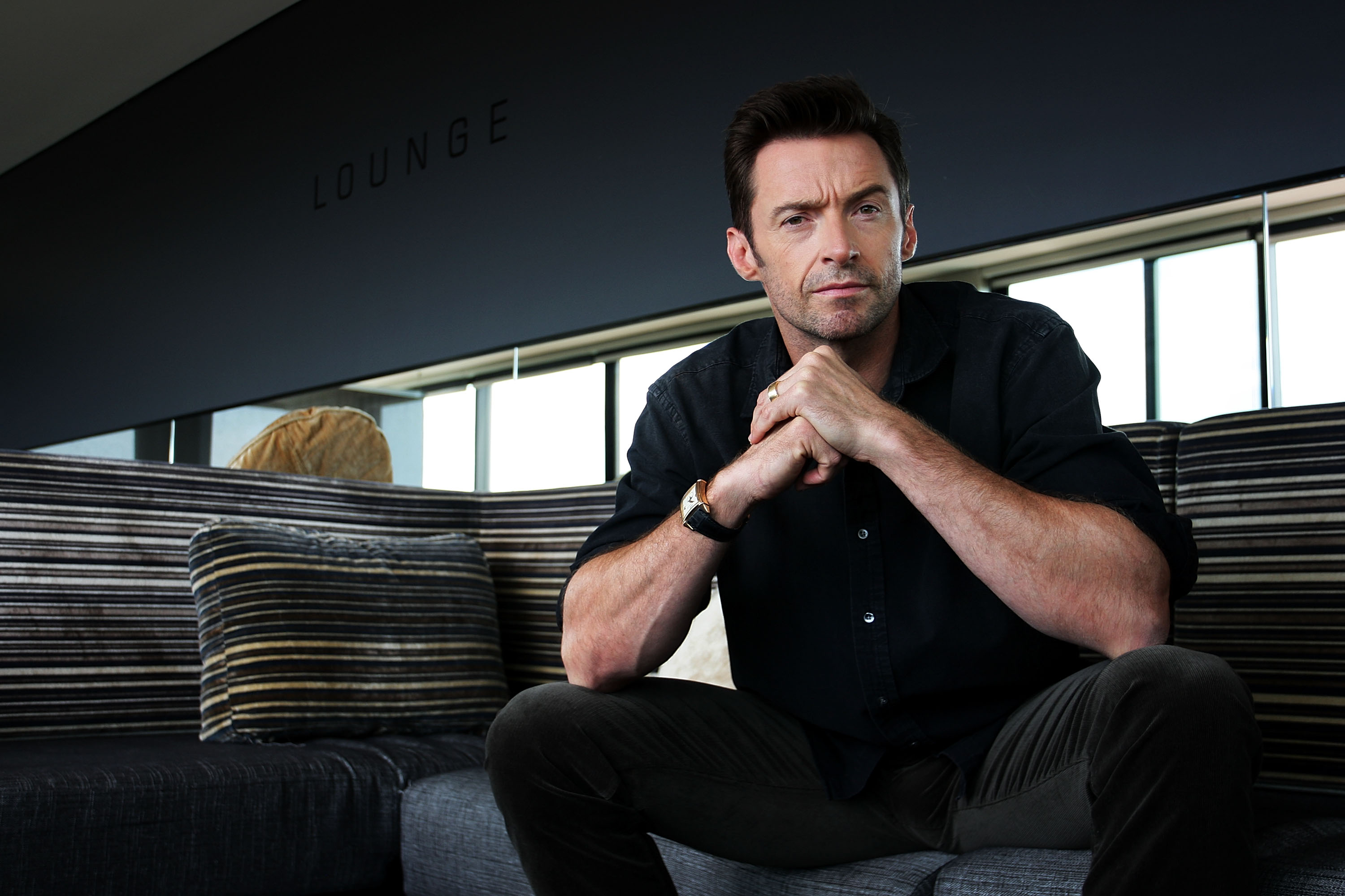 Australian actor Hugh Jackman posing during a photo call to promote his film "Real Steel" at the Intercontinental Hotel on September 27, 2011 in Sydney, Australia | Source: Getty Images