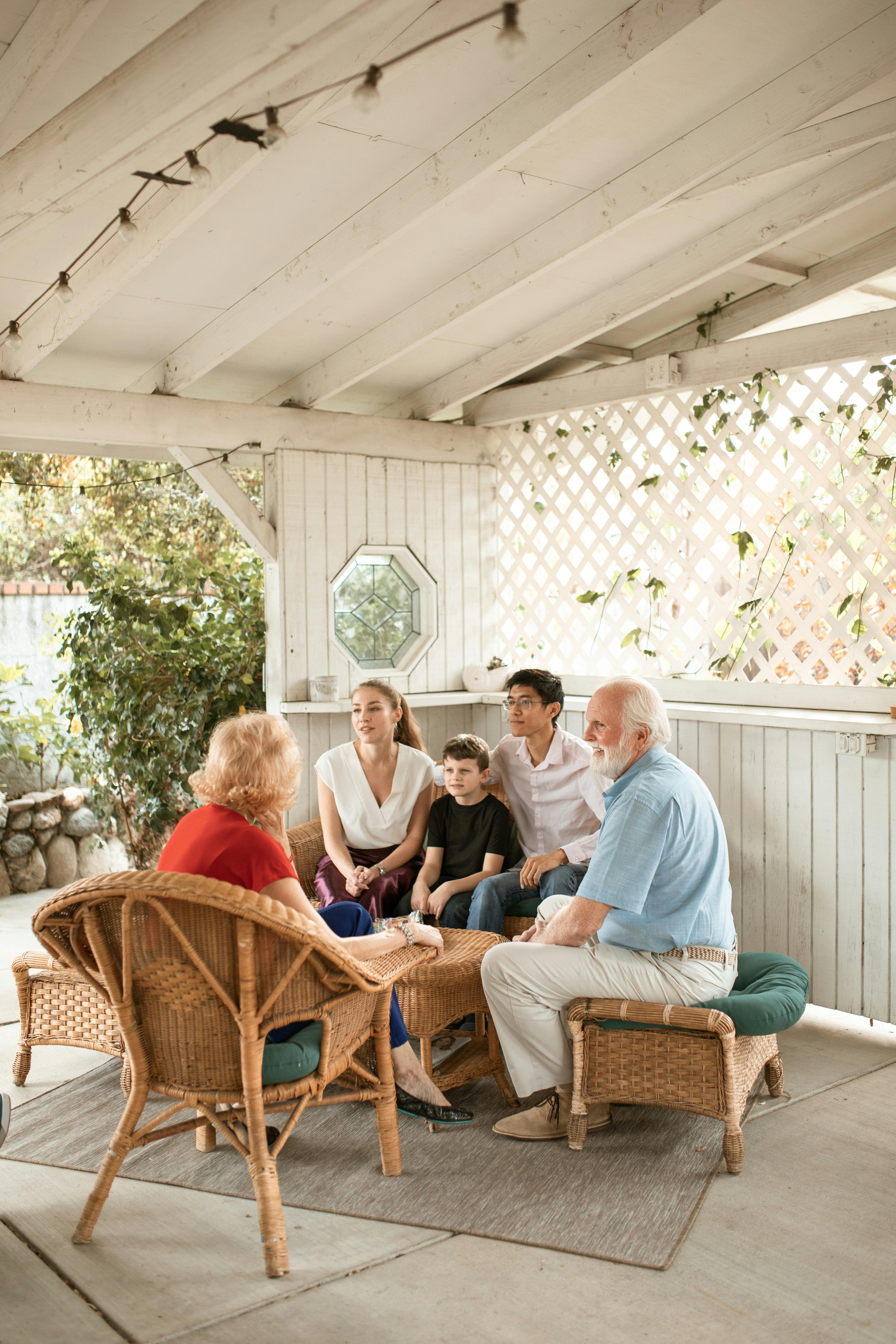 A young family talking to their parents | Source: Pexels