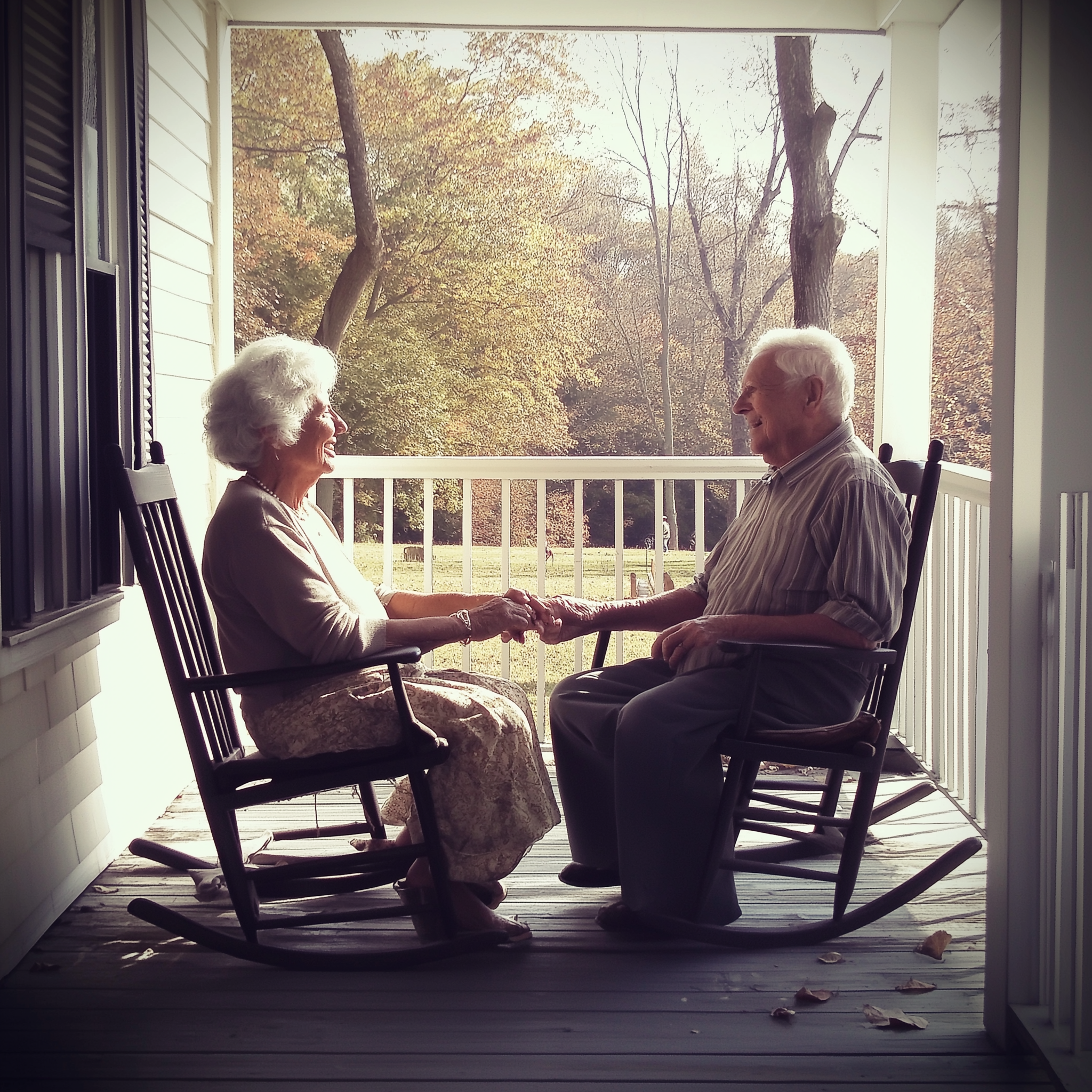 An elderly couple holding hands on a porch | Source: Midjourney