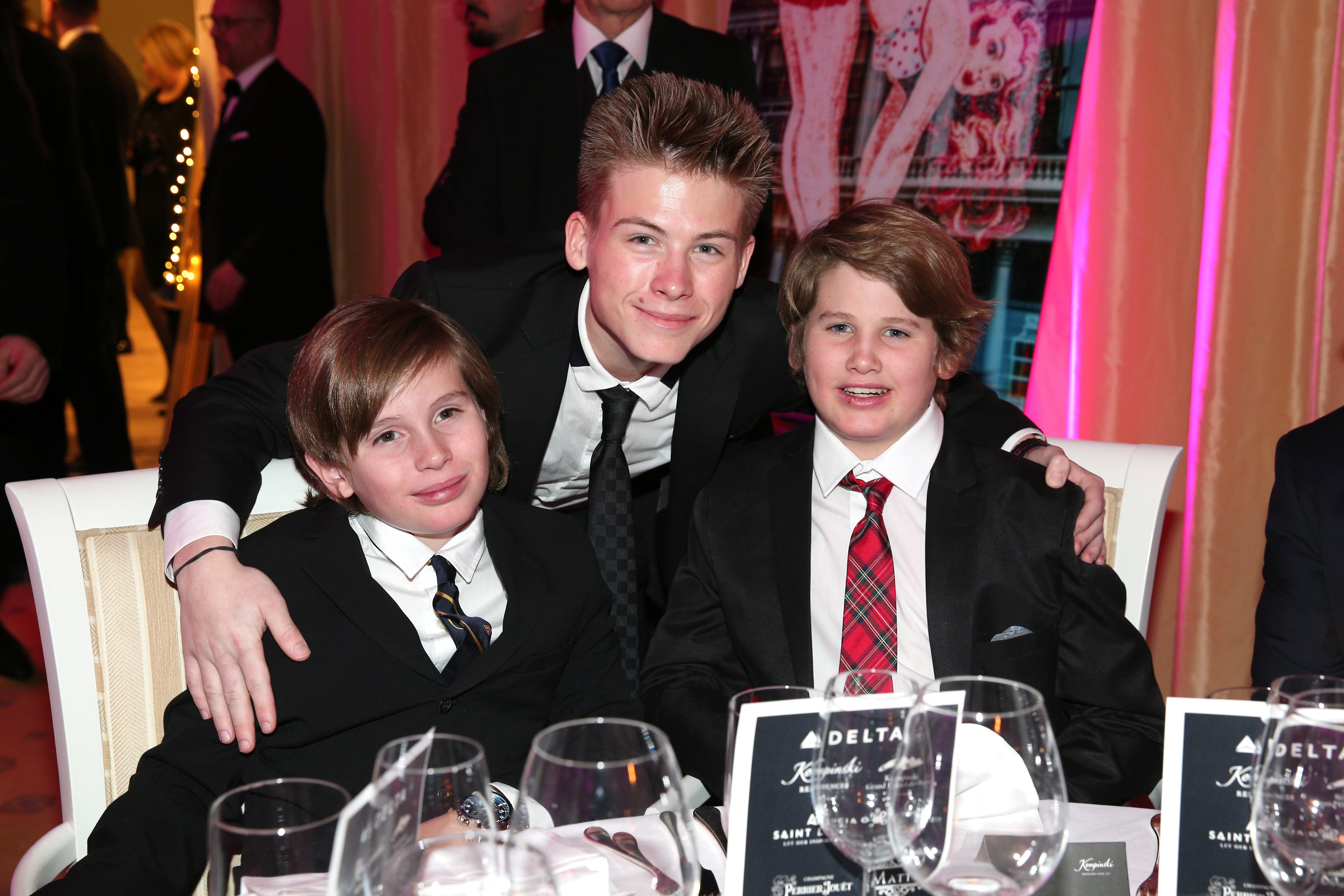 Sharon Stone's sons Quinn Kelly Stone, Roan Joseph Bronstein and Laird Vonne Stone attend a charity gala benefiting Planet Hope Foundation at Kempinski Grand Hotel des Bains on December 28, 2017 in Switzerland. | Photo: Getty Images